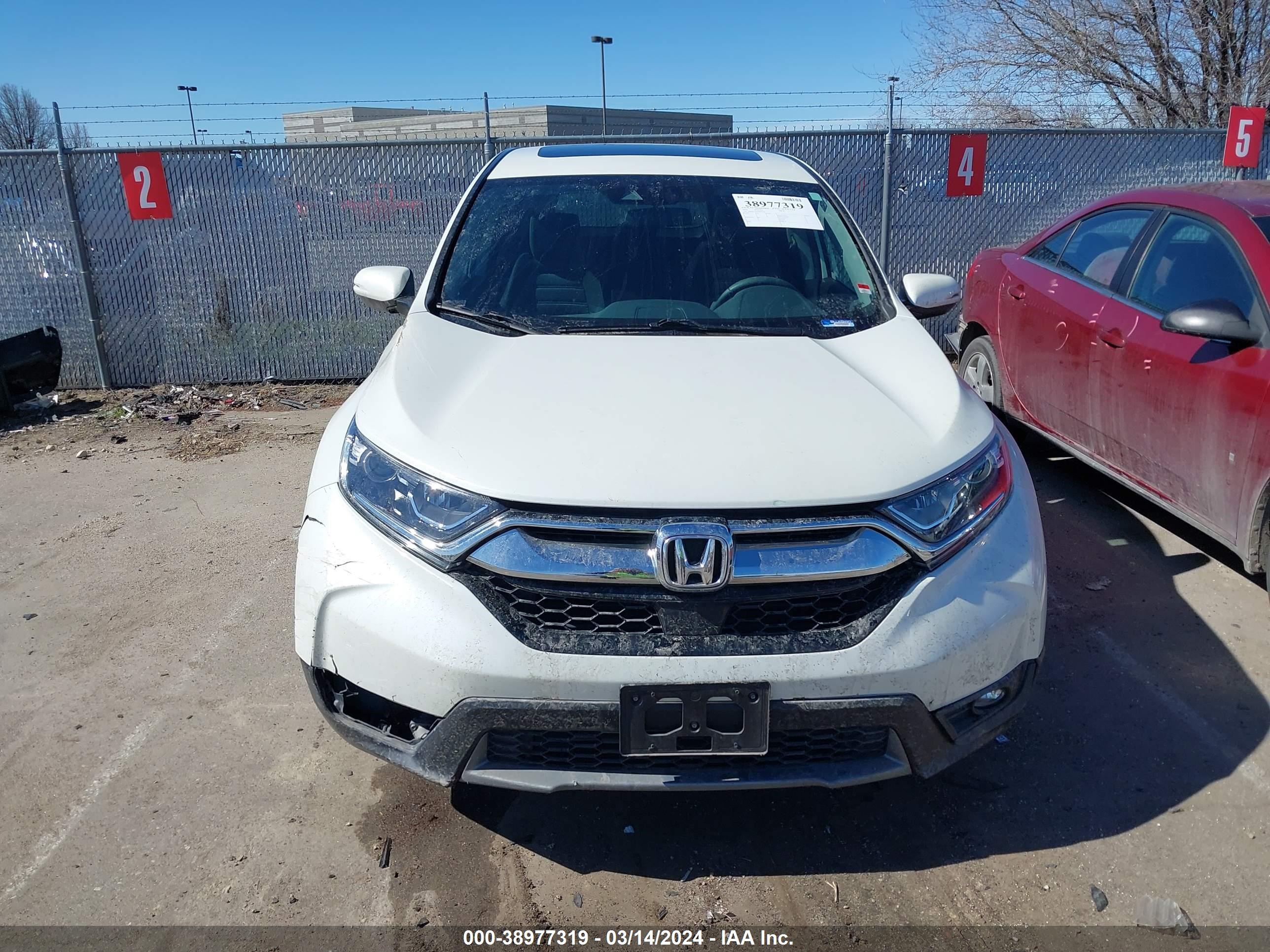 Photo 11 VIN: 2HKRW2H58JH692370 - HONDA CR-V 