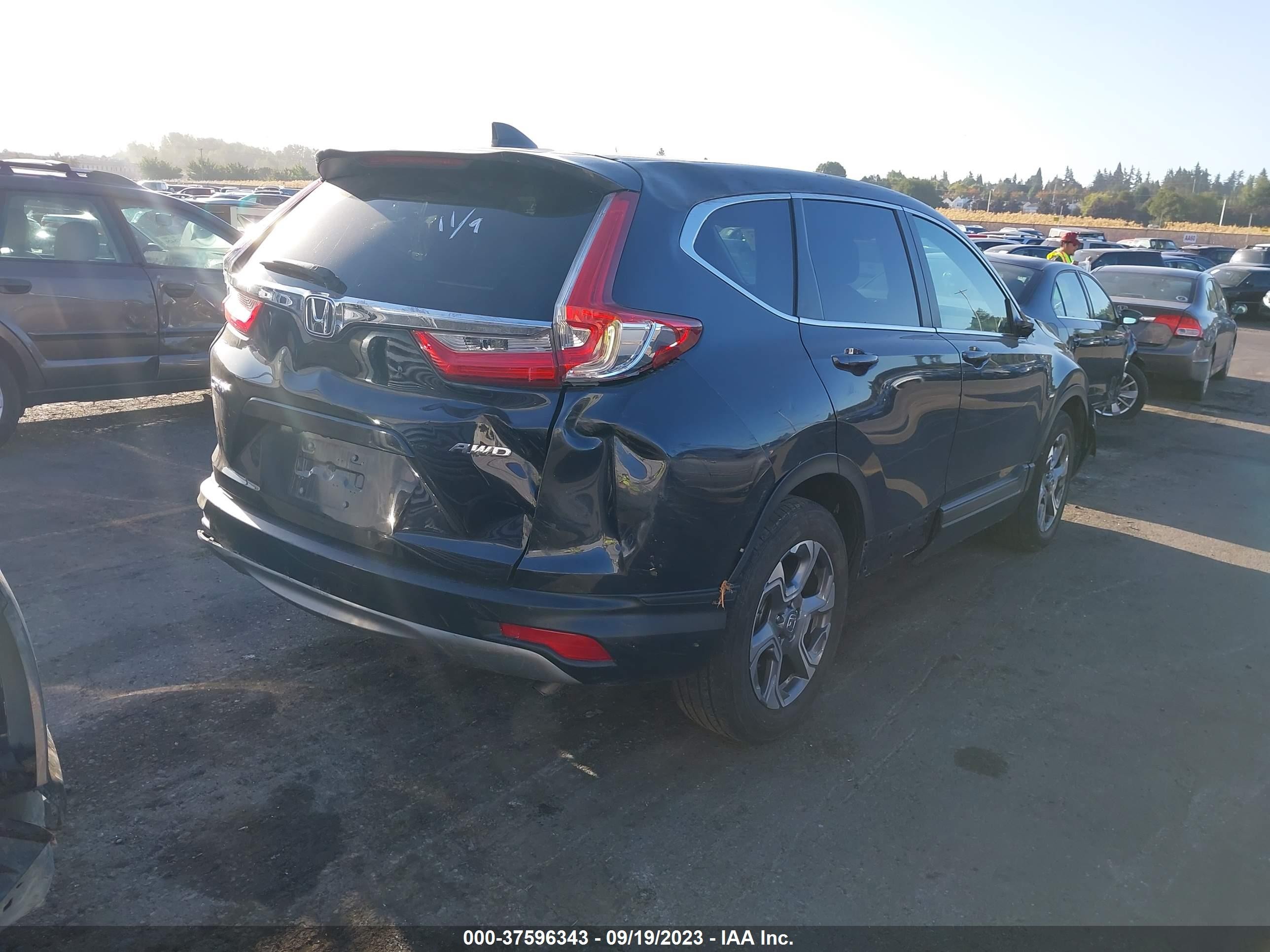 Photo 3 VIN: 2HKRW2H59KH616738 - HONDA CR-V 