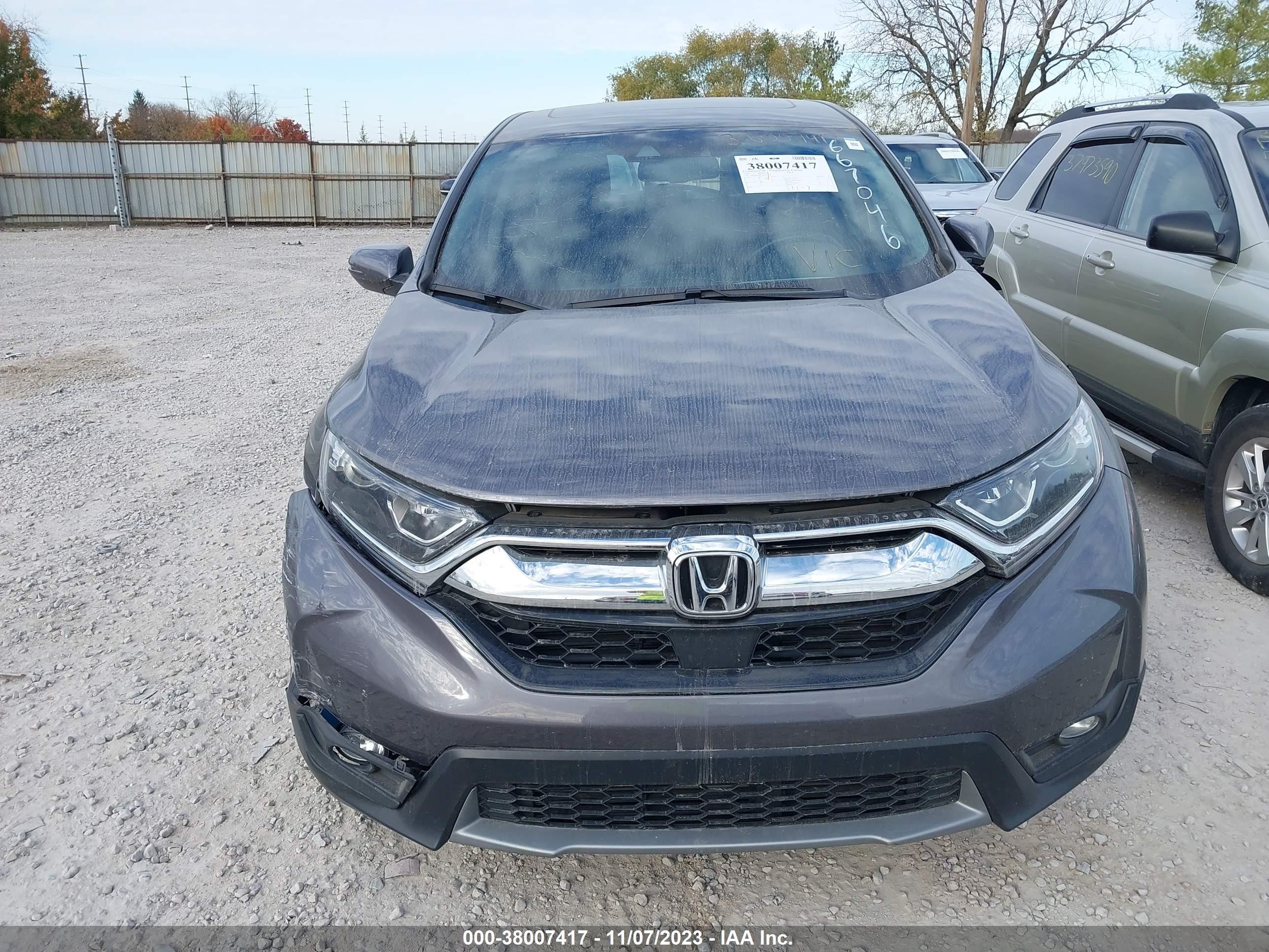 Photo 11 VIN: 2HKRW2H81KH667046 - HONDA CR-V 