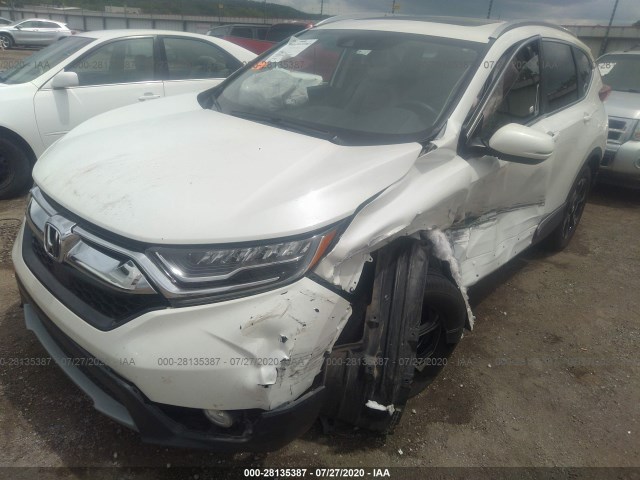 Photo 5 VIN: 2HKRW2H93JH604635 - HONDA CR-V 