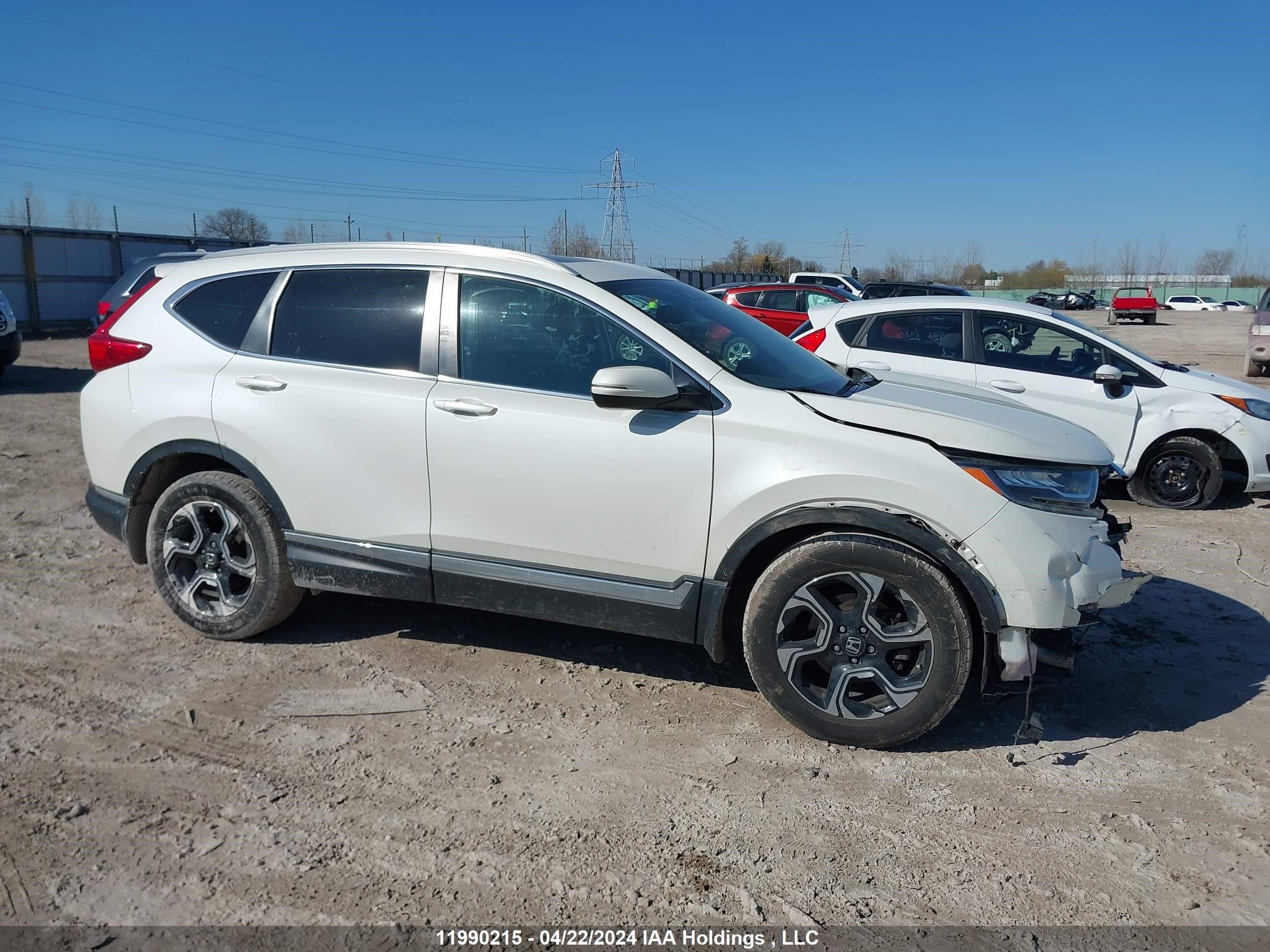 Photo 12 VIN: 2HKRW2H9XHH137076 - HONDA CR-V 