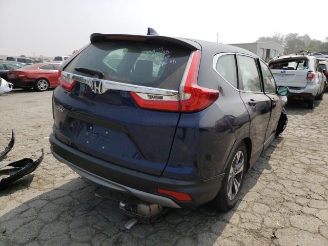 Photo 3 VIN: 2HKRW5H30KH413138 - HONDA CR-V LX 