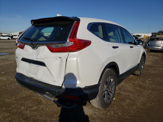 Photo 3 VIN: 2HKRW5H32KH400939 - HONDA CR-V LX 