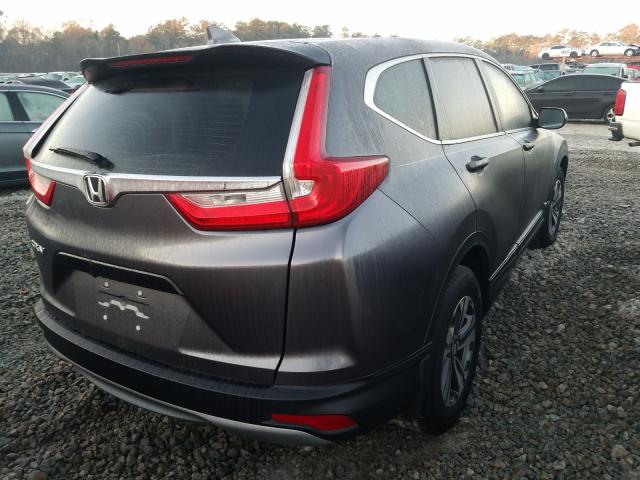 Photo 3 VIN: 2HKRW5H33KH409309 - HONDA CR-V LX 