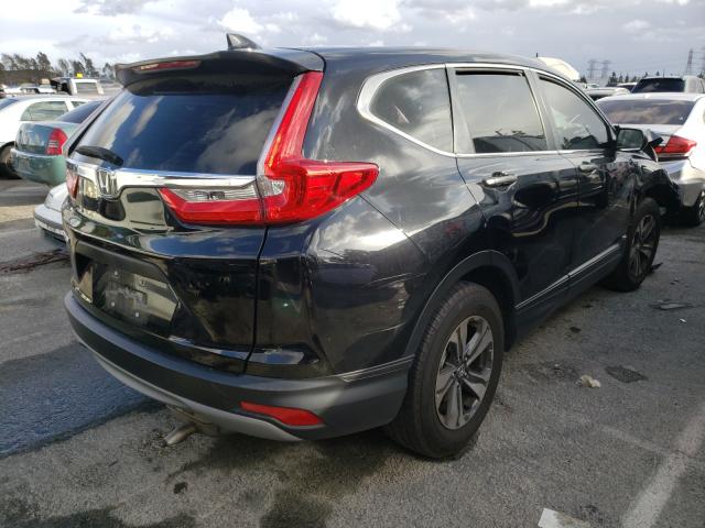 Photo 3 VIN: 2HKRW5H34KH412963 - HONDA CR-V LX 