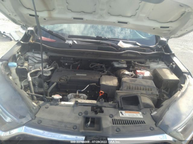 Photo 9 VIN: 2HKRW5H36JH406502 - HONDA CR-V 