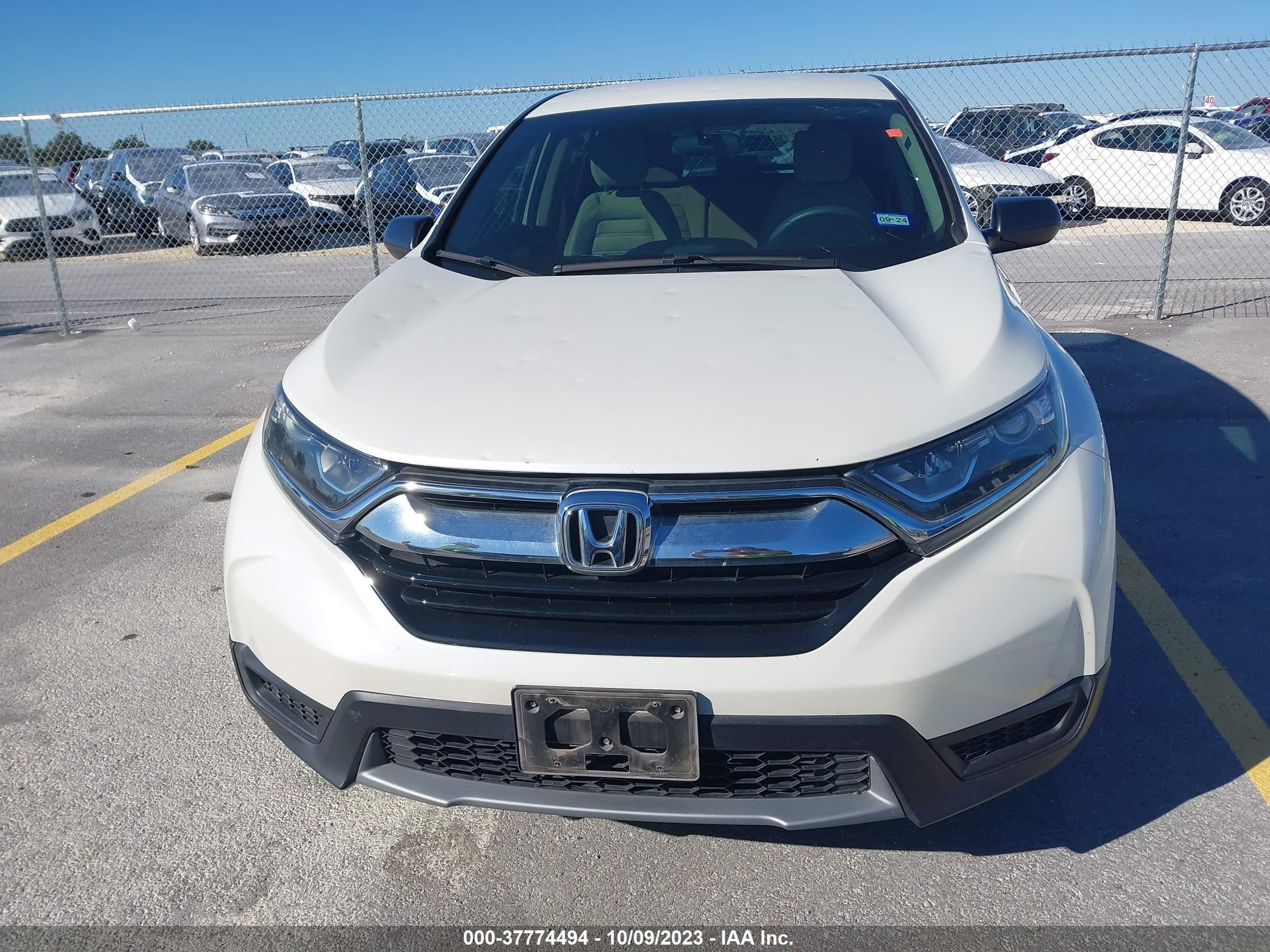 Photo 11 VIN: 2HKRW5H37JH421641 - HONDA CR-V 