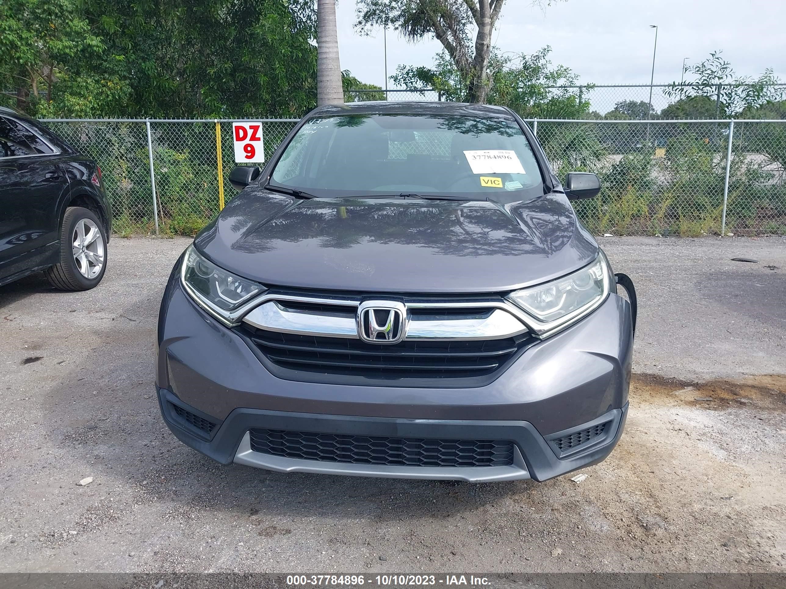 Photo 11 VIN: 2HKRW5H37KH419163 - HONDA CR-V 