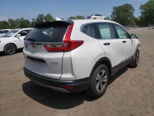 Photo 3 VIN: 2HKRW6H31KH218252 - HONDA CR-V LX 