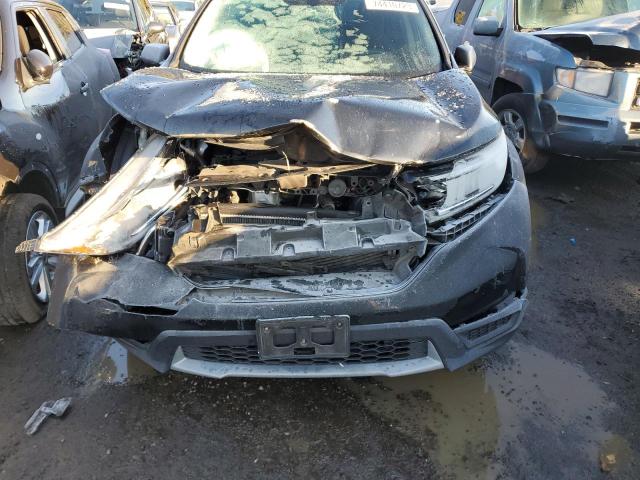 Photo 11 VIN: 2HKRW6H32JH213611 - HONDA CRV 