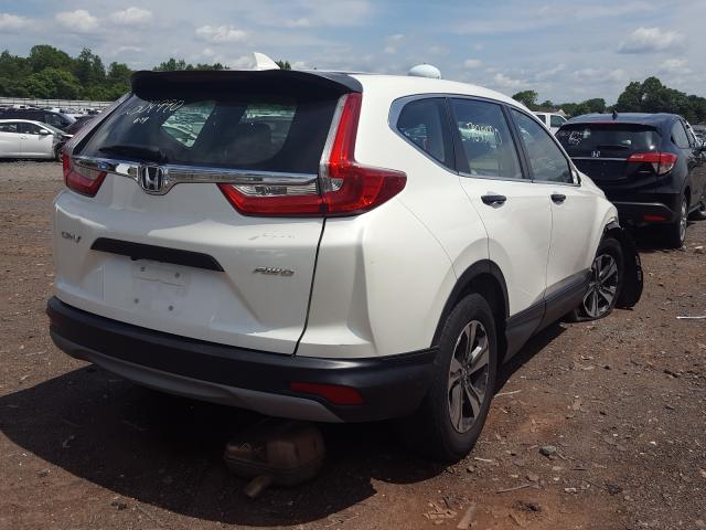 Photo 3 VIN: 2HKRW6H37JH210381 - HONDA CR-V LX 