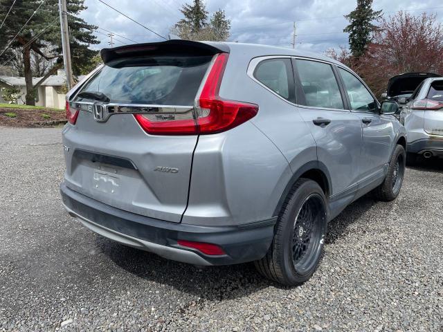 Photo 3 VIN: 2HKRW6H3XKH201918 - HONDA CR-V LX 