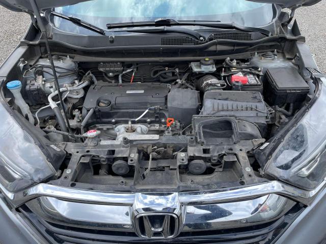 Photo 6 VIN: 2HKRW6H3XKH201918 - HONDA CR-V LX 