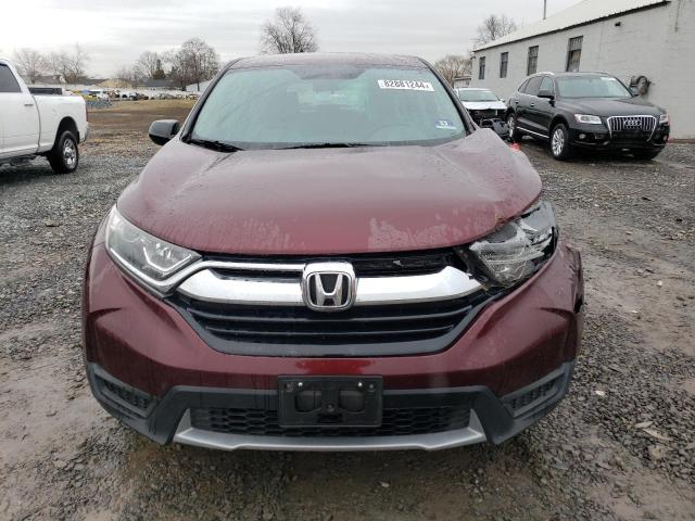 Photo 4 VIN: 2HKRW6H3XKH218542 - HONDA CR-V LX 