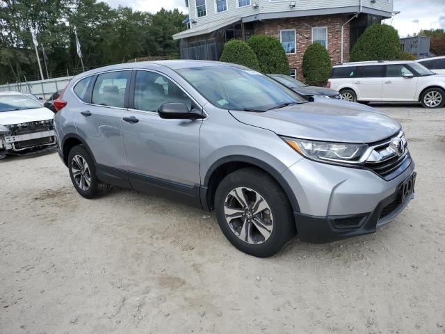 Photo 3 VIN: 2HKRW6H3XKH234319 - HONDA CR-V LX 