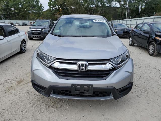 Photo 4 VIN: 2HKRW6H3XKH234319 - HONDA CR-V LX 