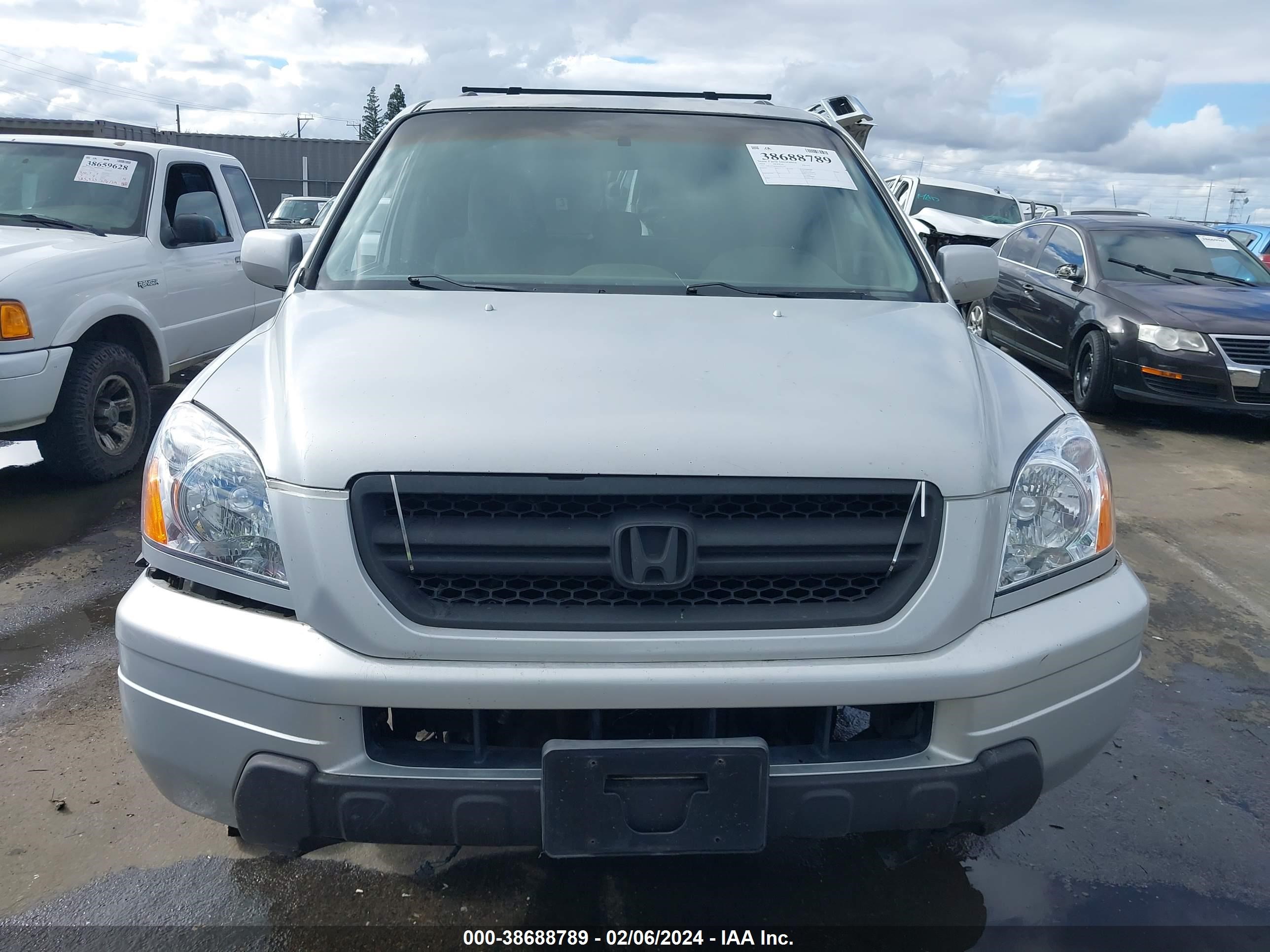 Photo 11 VIN: 2HKYF18404H507519 - HONDA PILOT 