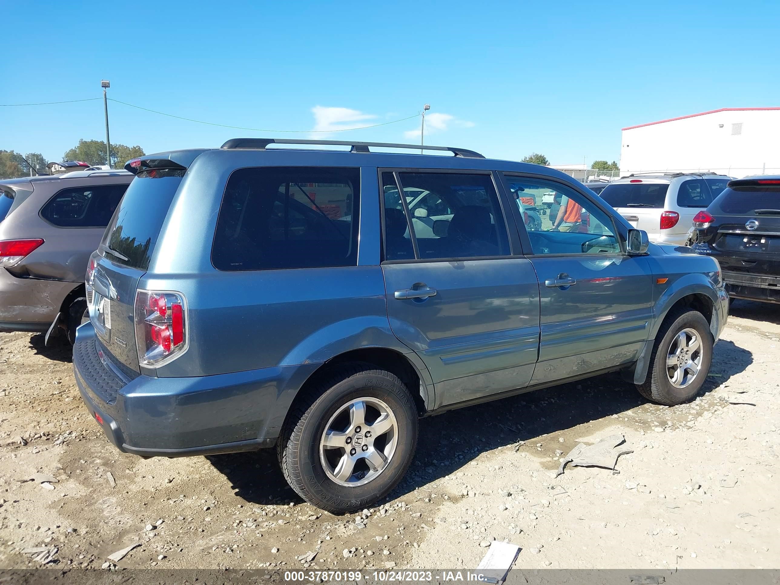 Photo 12 VIN: 2HKYF18406H558747 - HONDA PILOT 