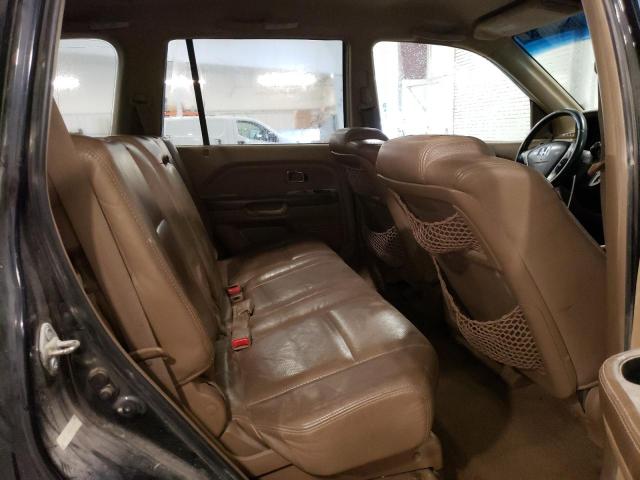 Photo 10 VIN: 2HKYF18574H562994 - HONDA PILOT 