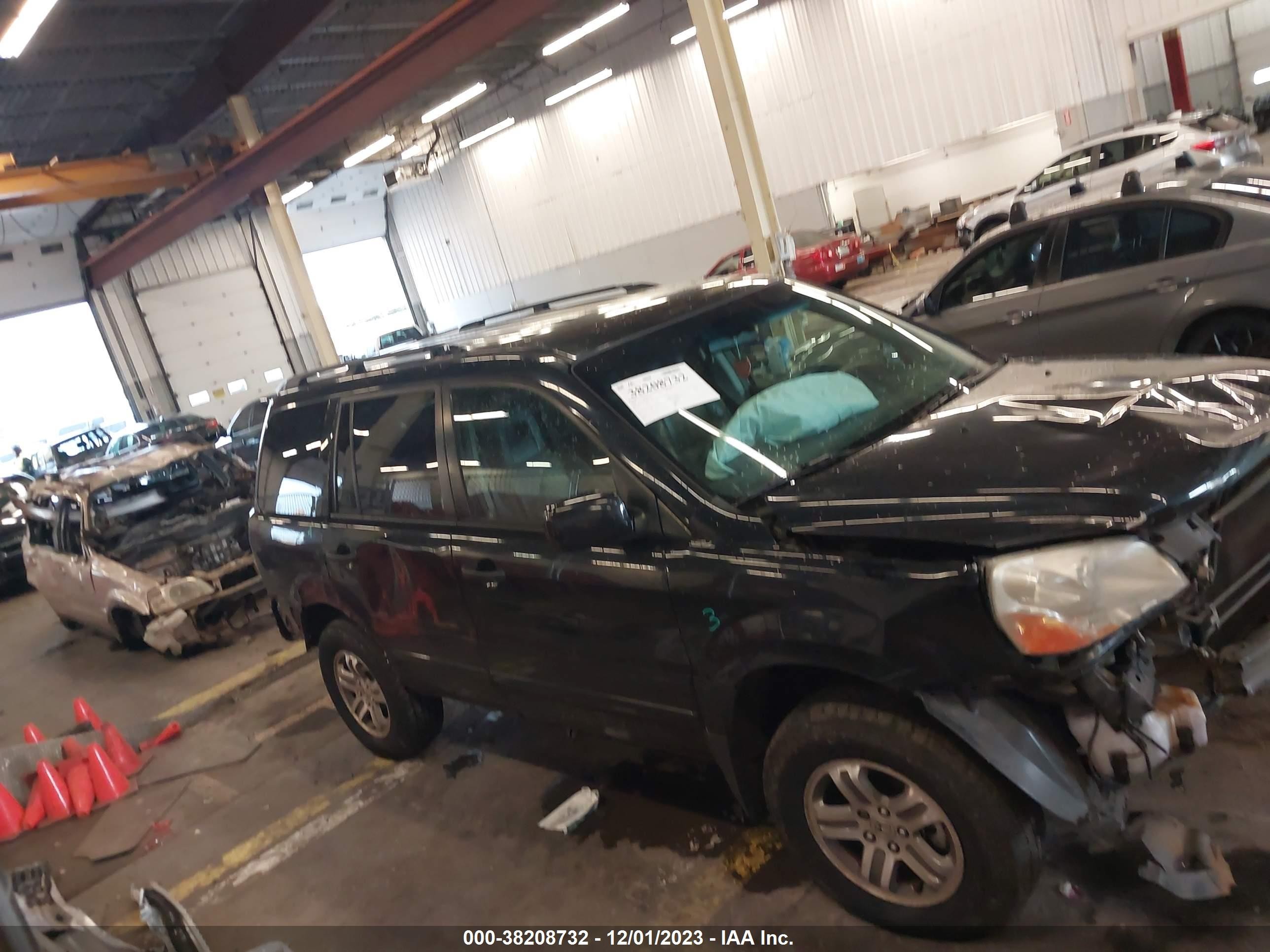 Photo 12 VIN: 2HKYF18574H570044 - HONDA PILOT 