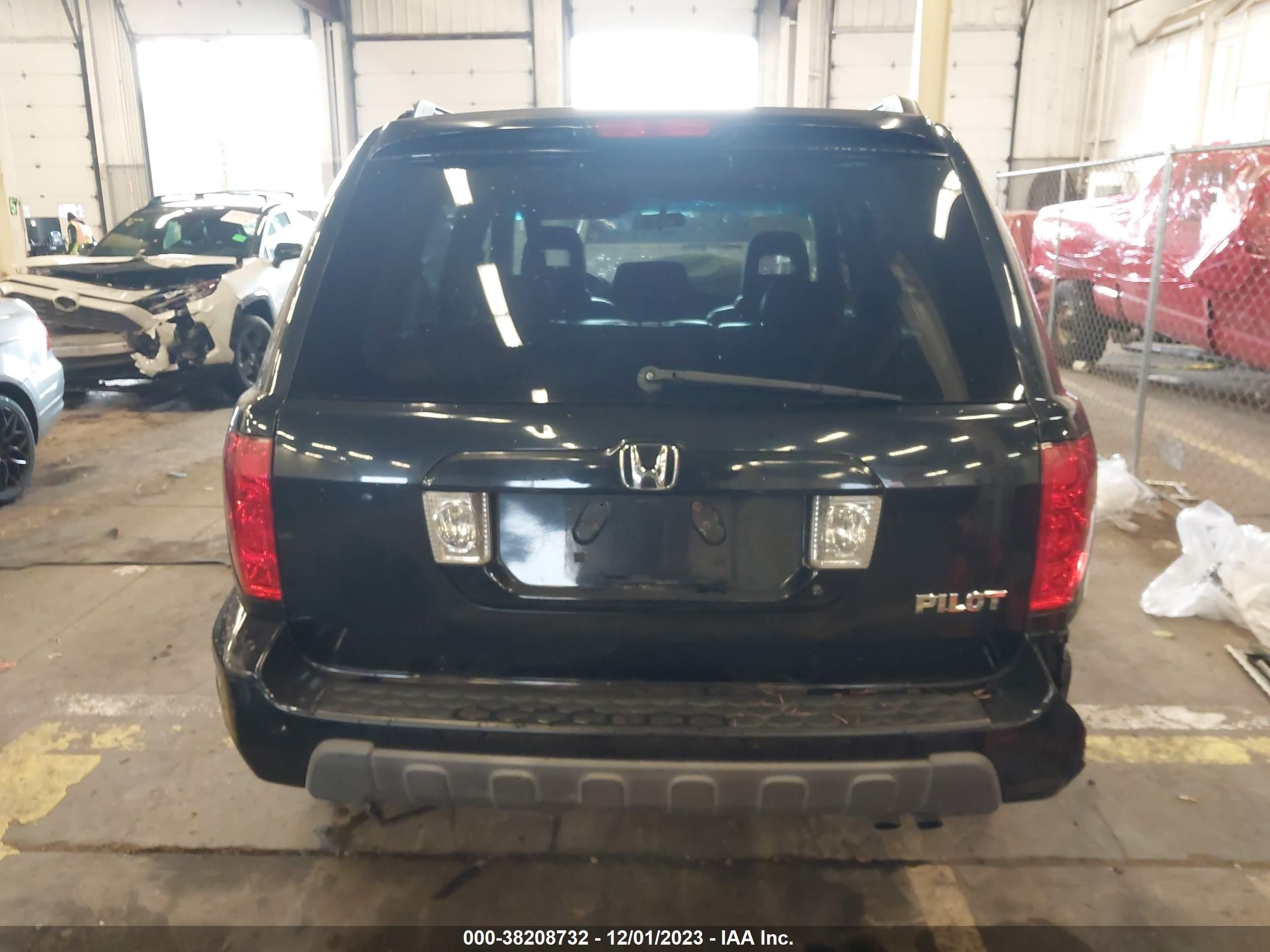 Photo 15 VIN: 2HKYF18574H570044 - HONDA PILOT 