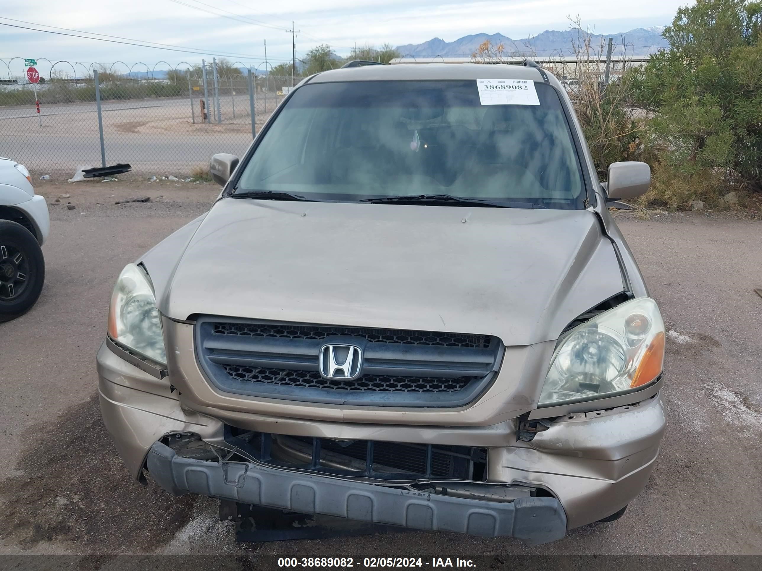 Photo 11 VIN: 2HKYF185X4H550676 - HONDA PILOT 