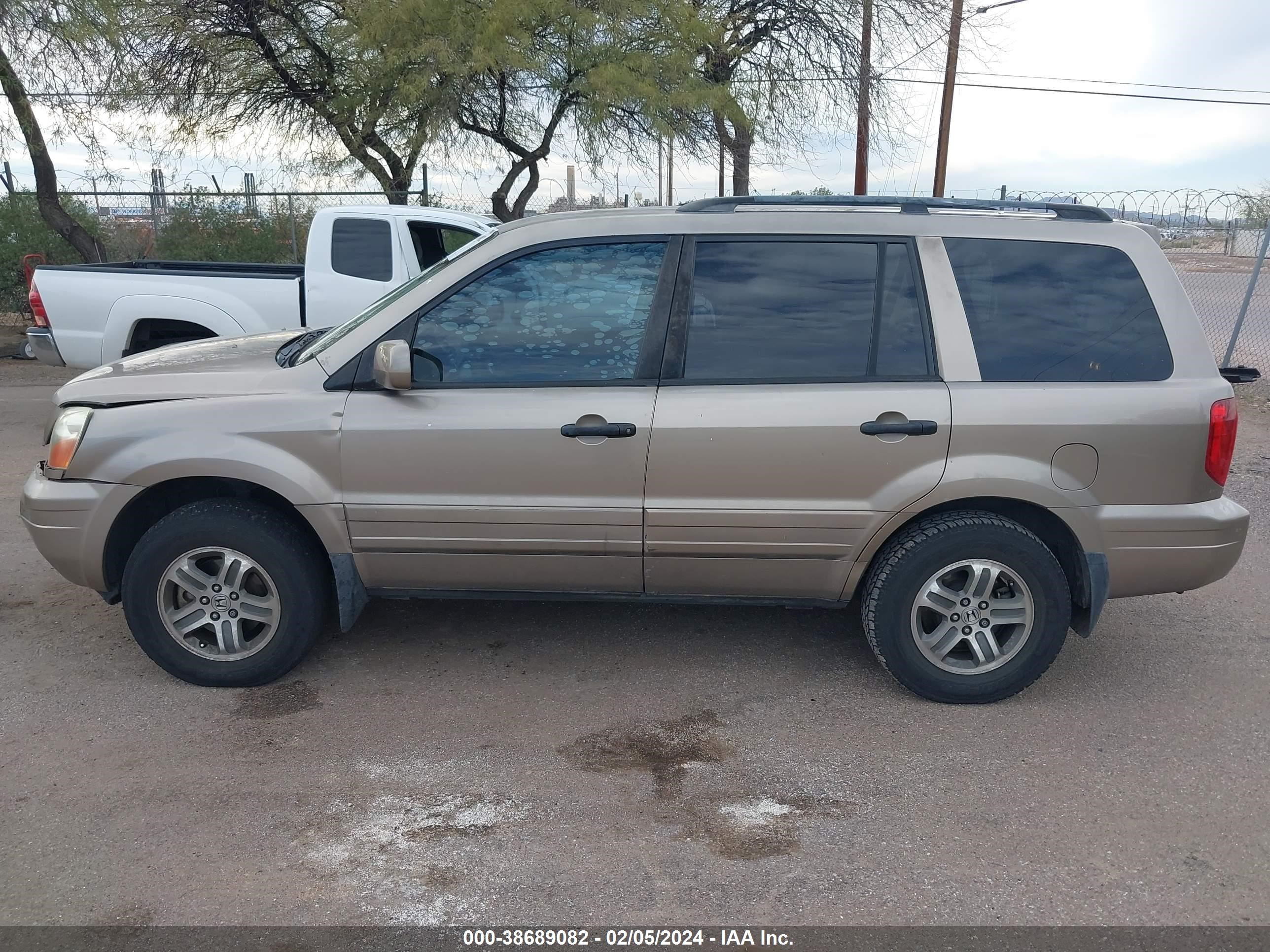 Photo 13 VIN: 2HKYF185X4H550676 - HONDA PILOT 