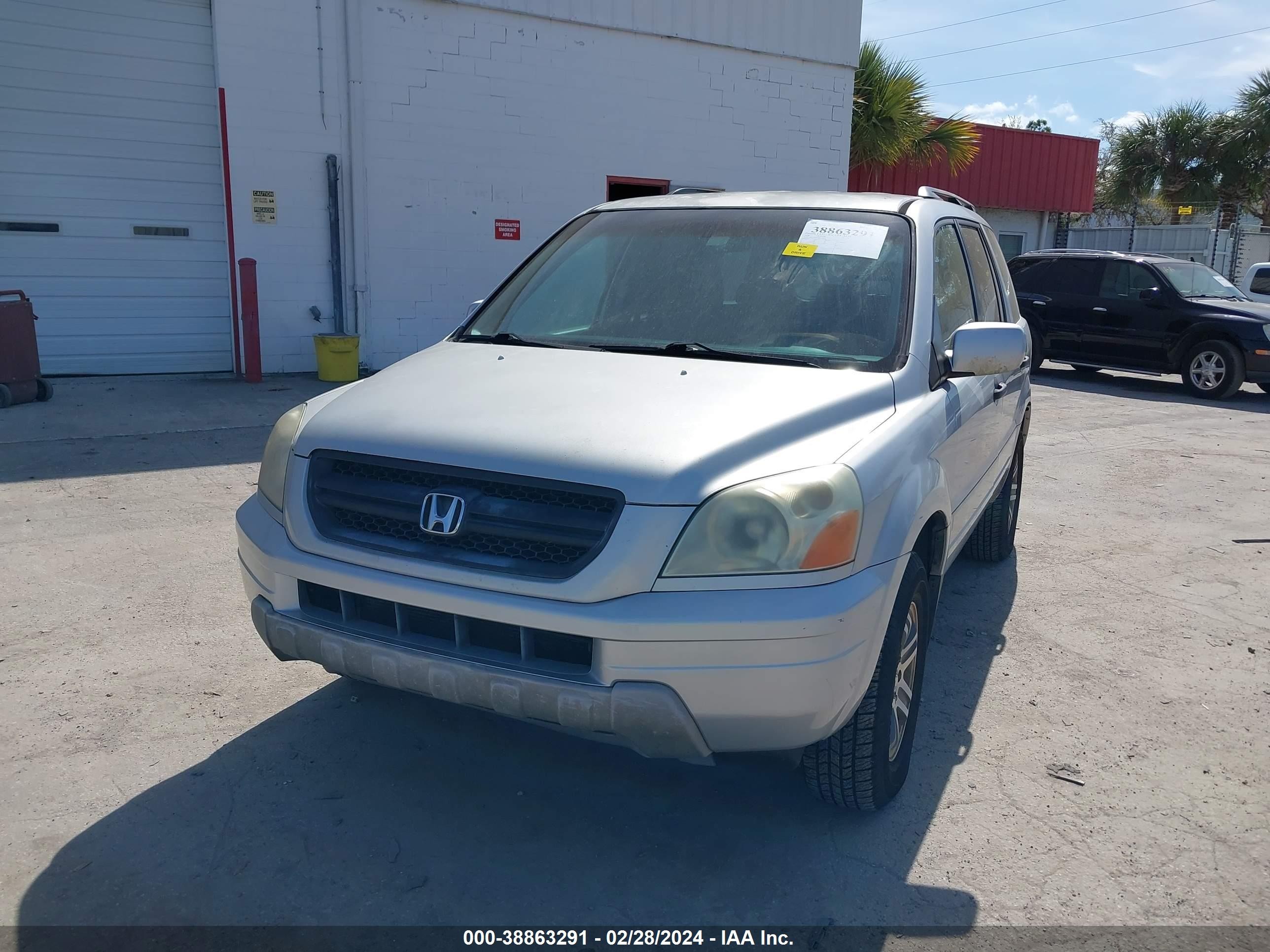 Photo 5 VIN: 2HKYF185X4H553836 - HONDA PILOT 