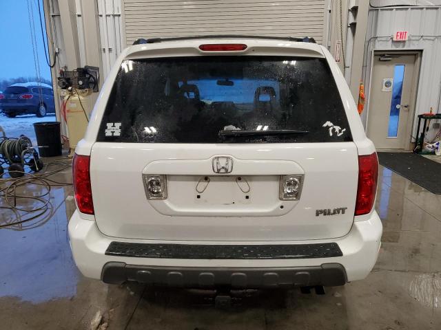 Photo 5 VIN: 2HKYF185X4H560320 - HONDA PILOT 