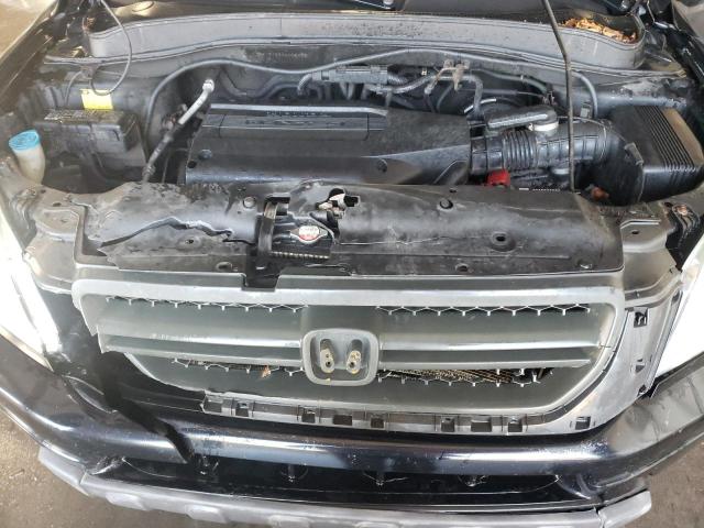 Photo 11 VIN: 2HKYF185X4H589557 - HONDA PILOT 