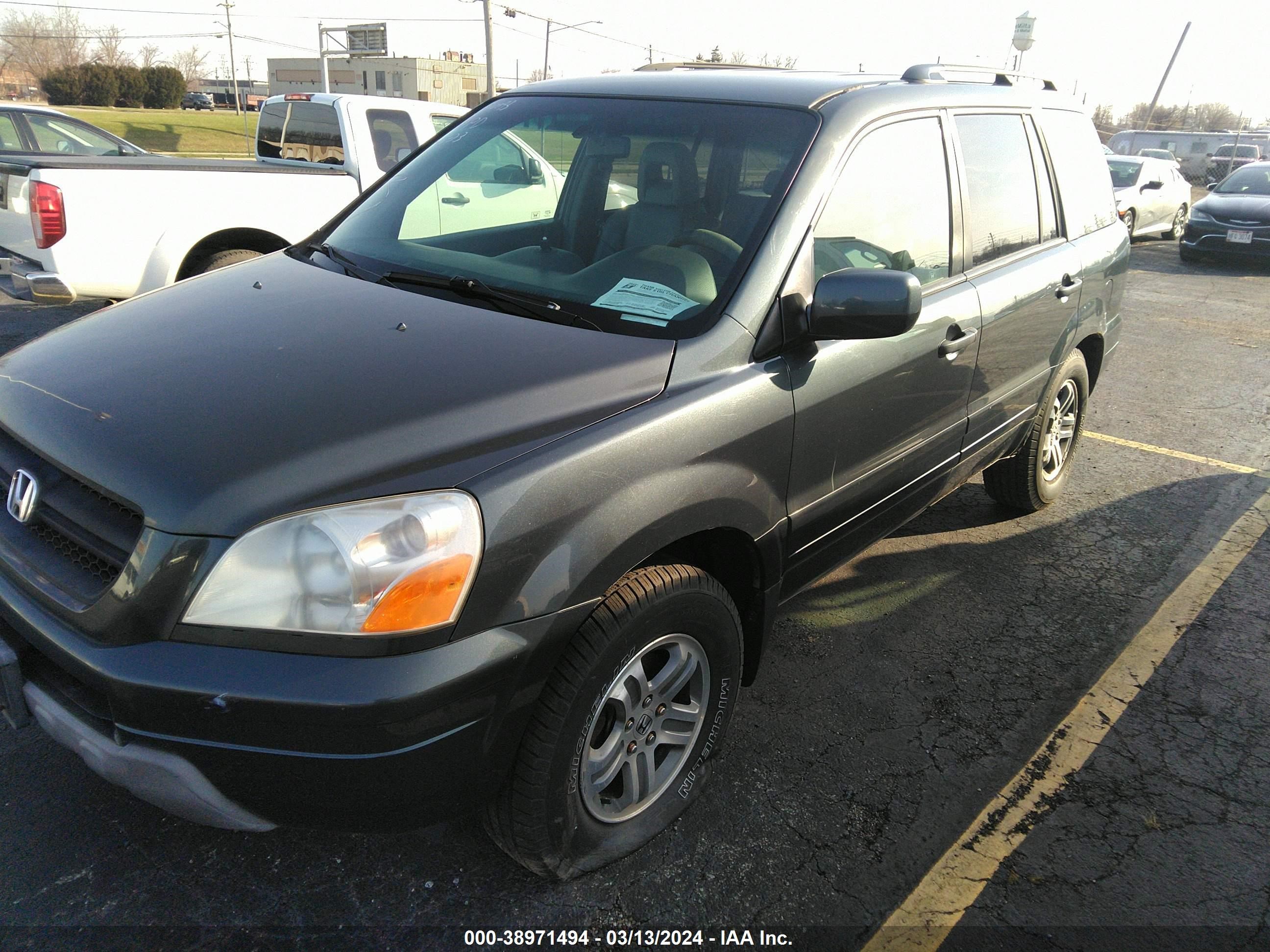 Photo 13 VIN: 2HKYF185X4H609855 - HONDA PILOT 