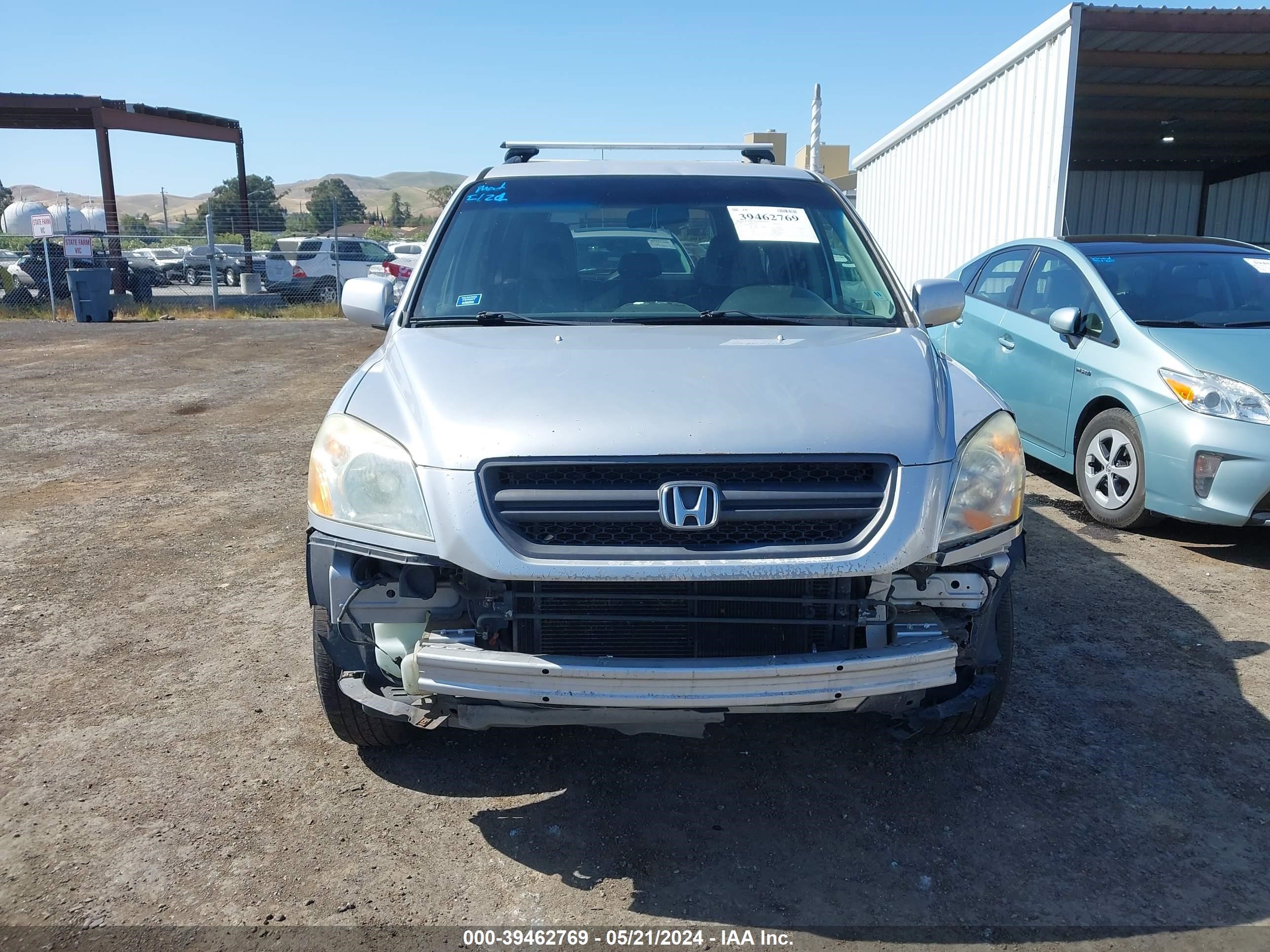 Photo 12 VIN: 2HKYF18604H524905 - HONDA PILOT 