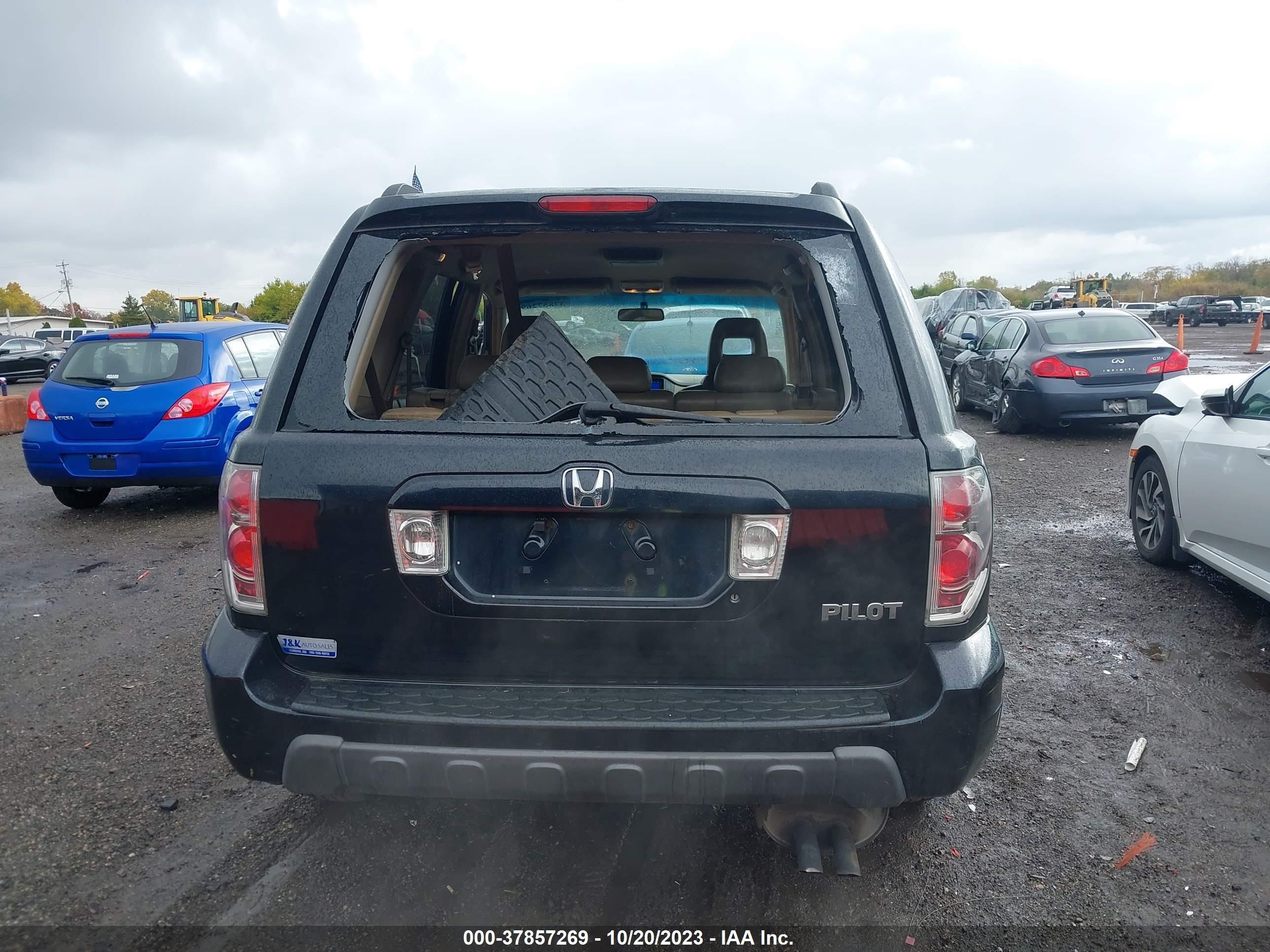 Photo 15 VIN: 2HKYF18614H505053 - HONDA PILOT 