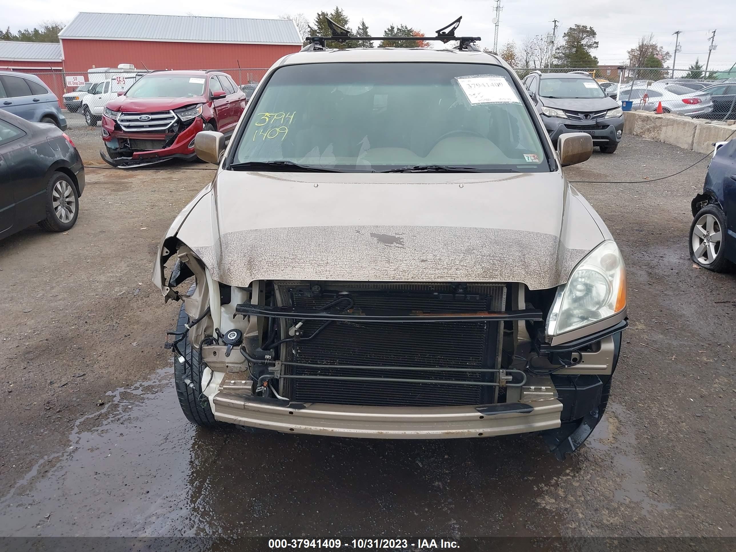 Photo 12 VIN: 2HKYF18694H612299 - HONDA PILOT 