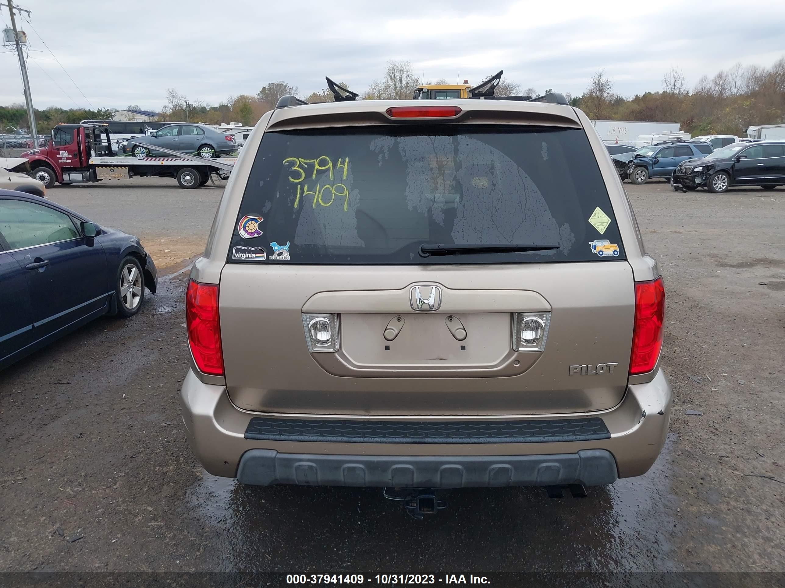 Photo 16 VIN: 2HKYF18694H612299 - HONDA PILOT 