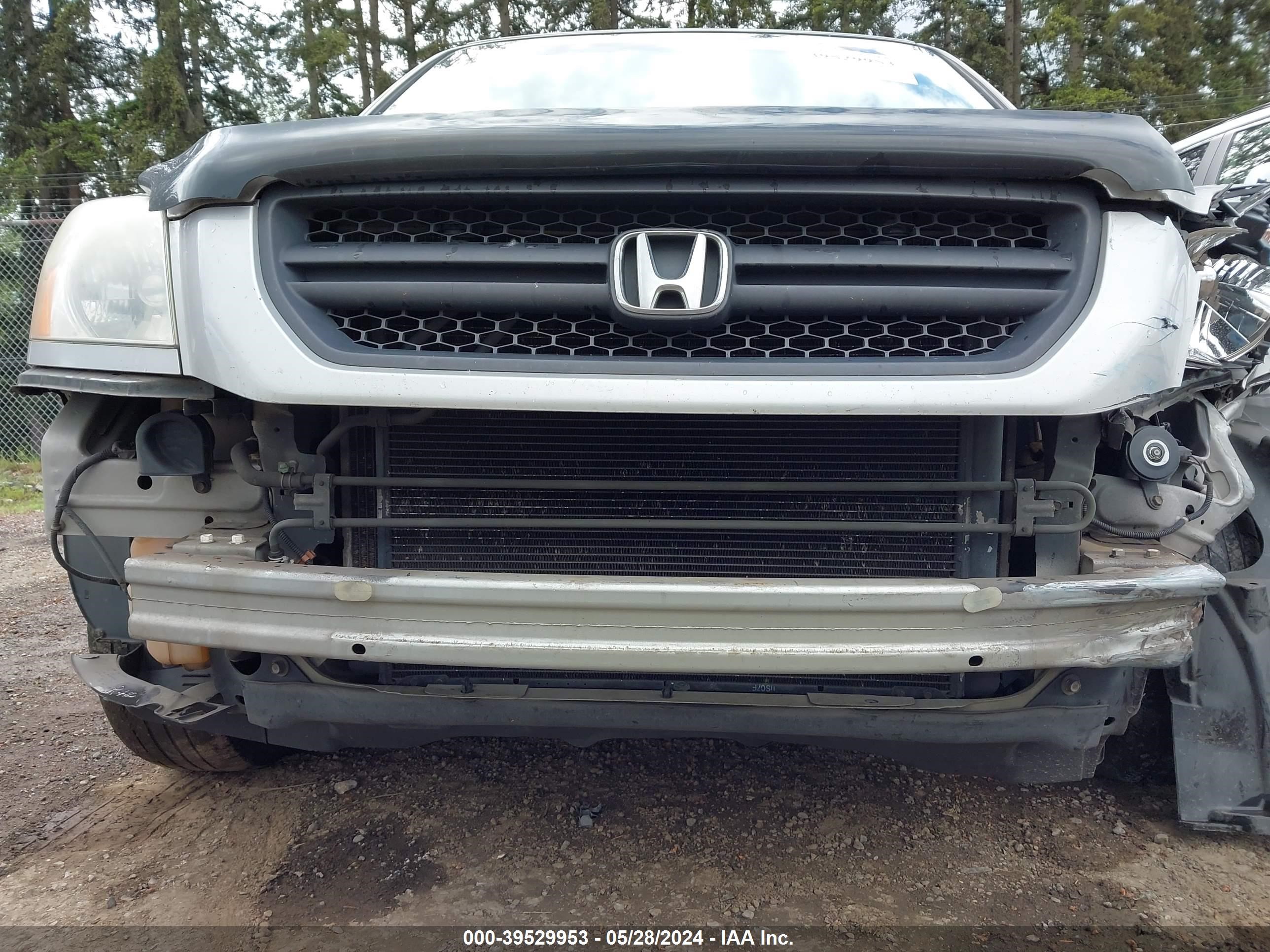 Photo 12 VIN: 2HKYF18724H609981 - HONDA PILOT 