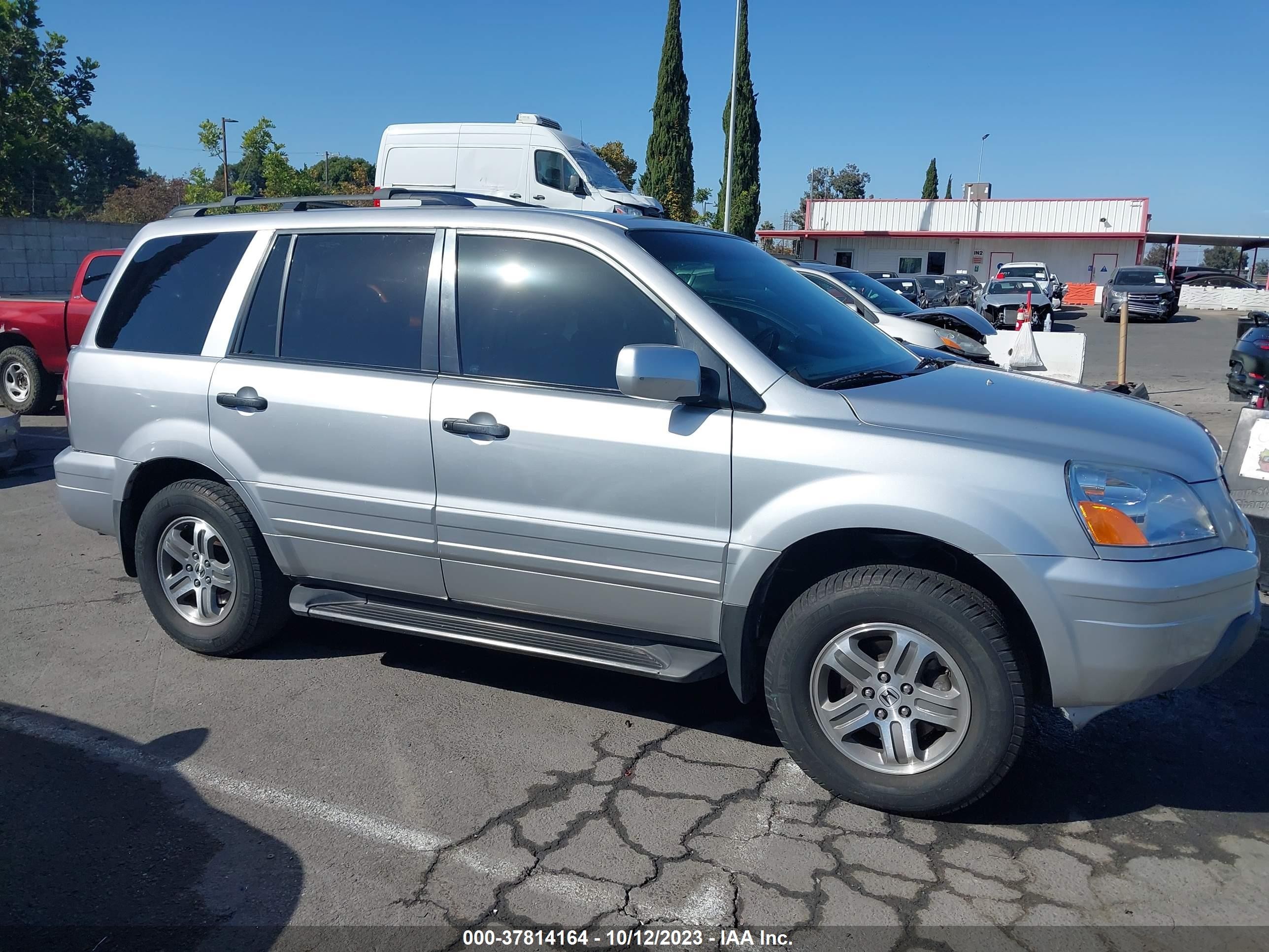 Photo 12 VIN: 2HKYF18764H548022 - HONDA PILOT 