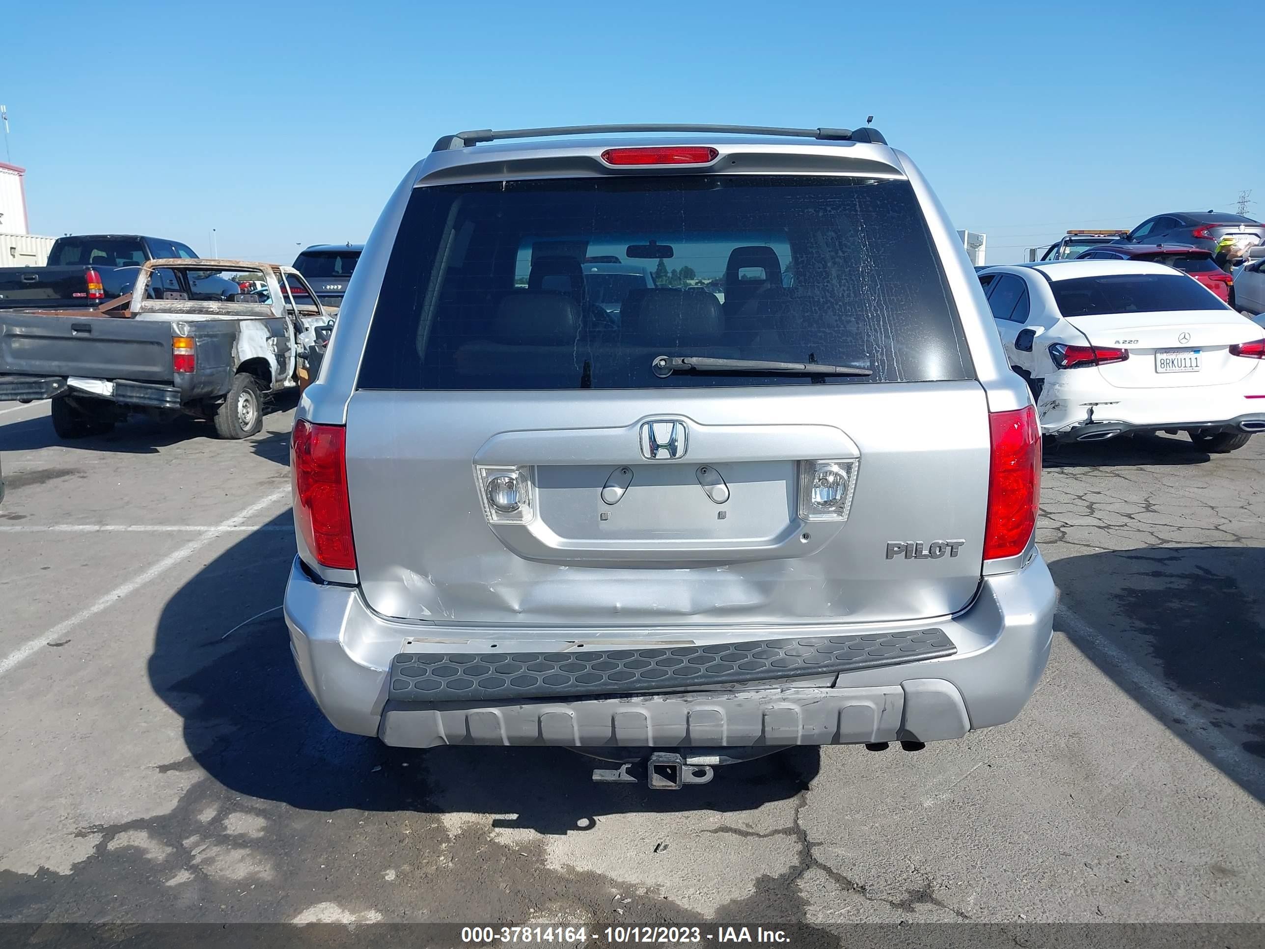 Photo 15 VIN: 2HKYF18764H548022 - HONDA PILOT 