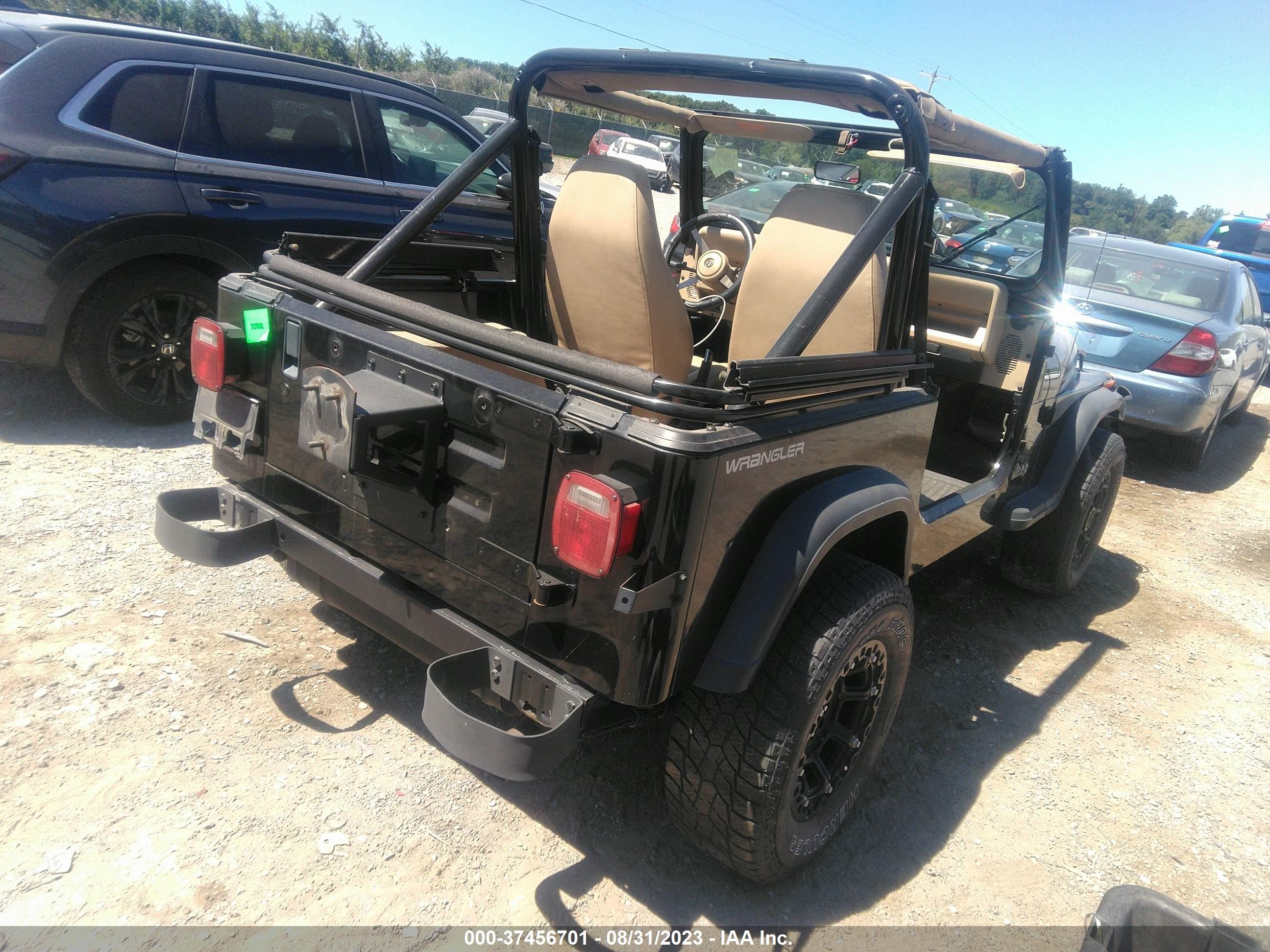 Photo 3 VIN: 2J4FY19P0MJ147013 - JEEP WRANGLER 