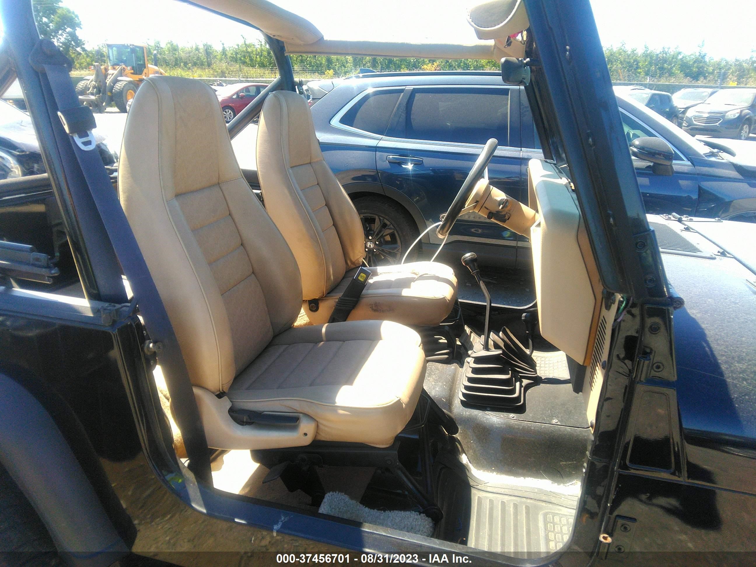 Photo 4 VIN: 2J4FY19P0MJ147013 - JEEP WRANGLER 