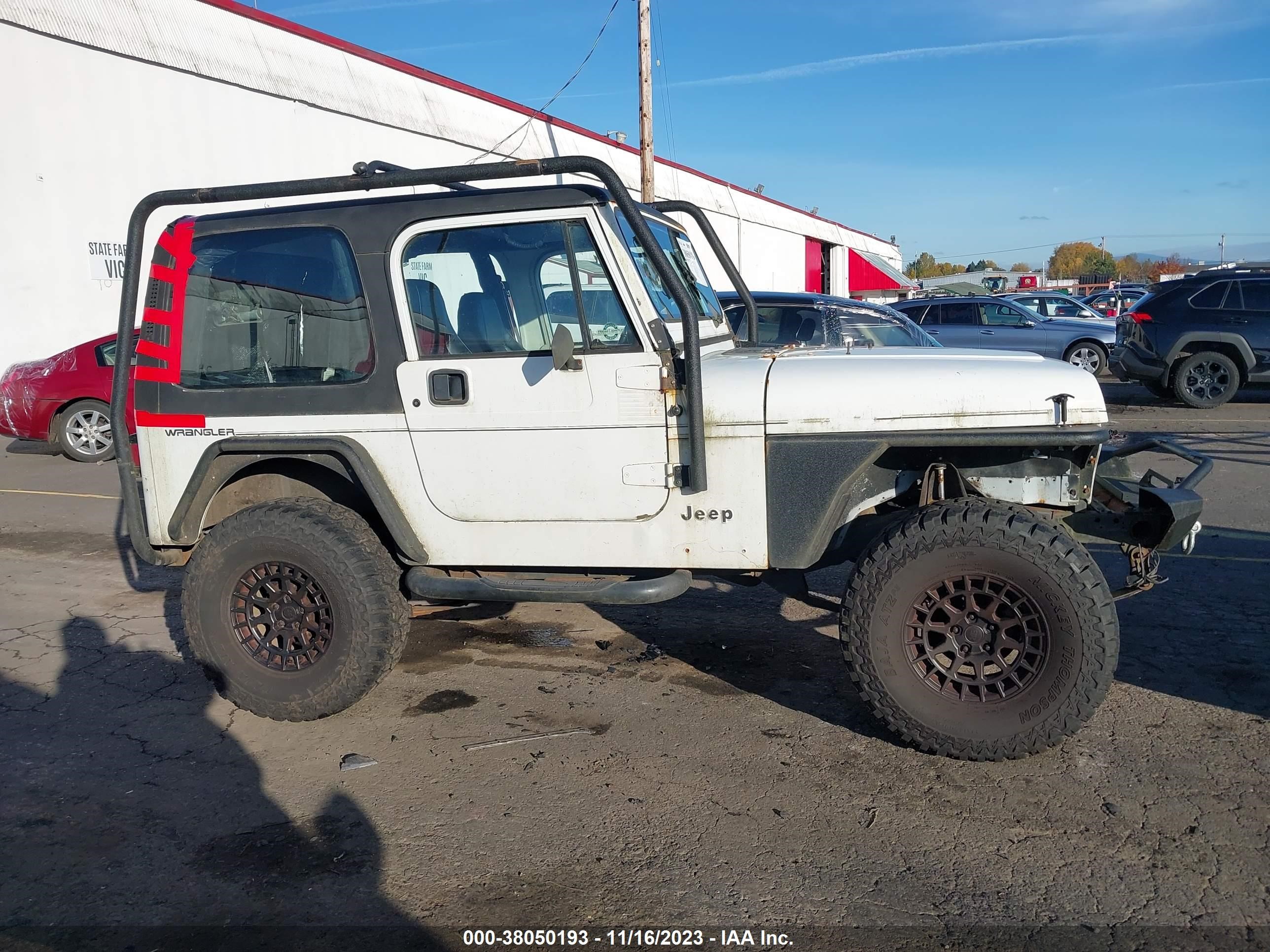 Photo 12 VIN: 2J4FY19P2NJ541923 - JEEP WRANGLER 