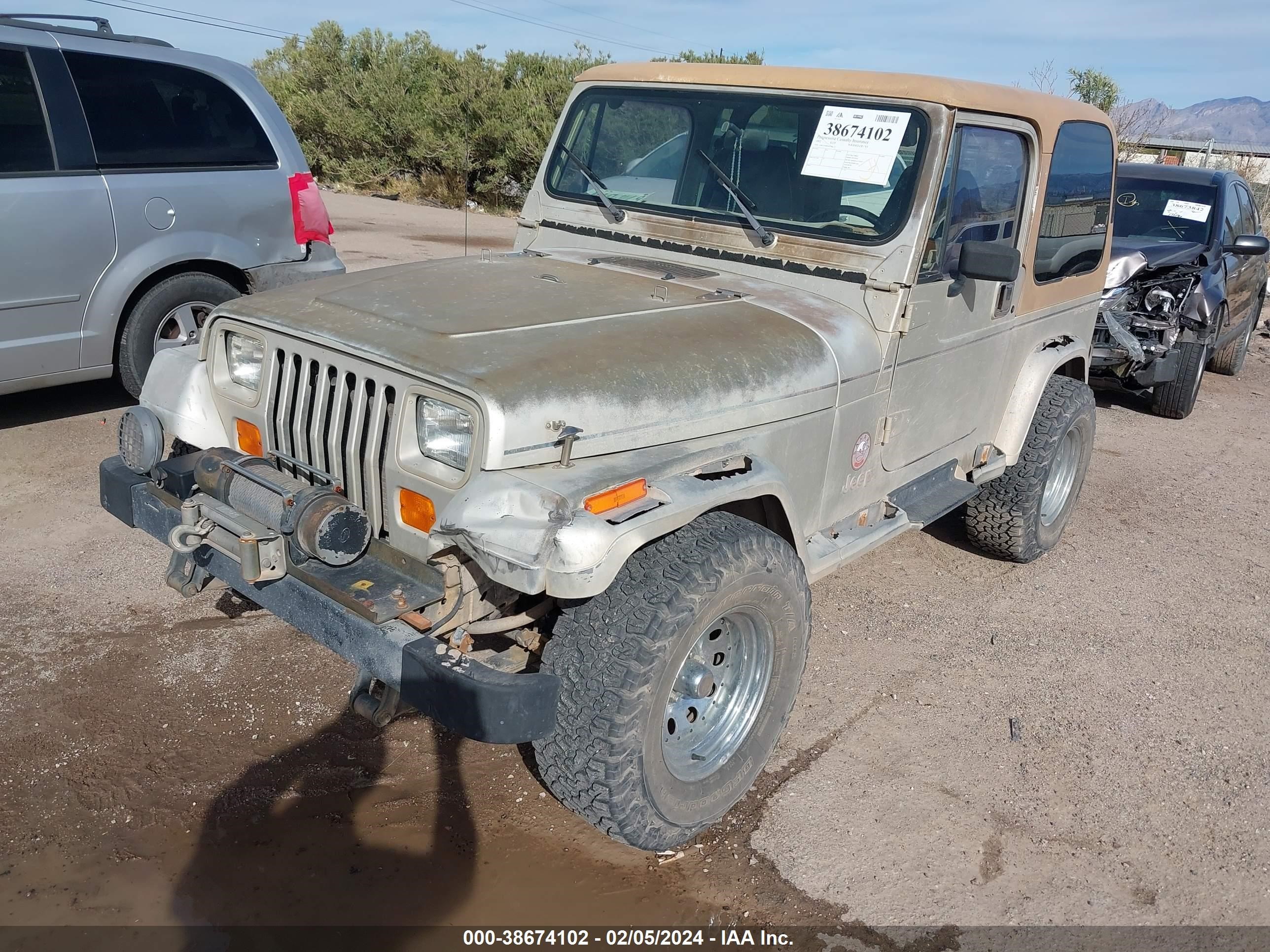 Photo 1 VIN: 2J4FY49S9NJ556571 - JEEP WRANGLER 