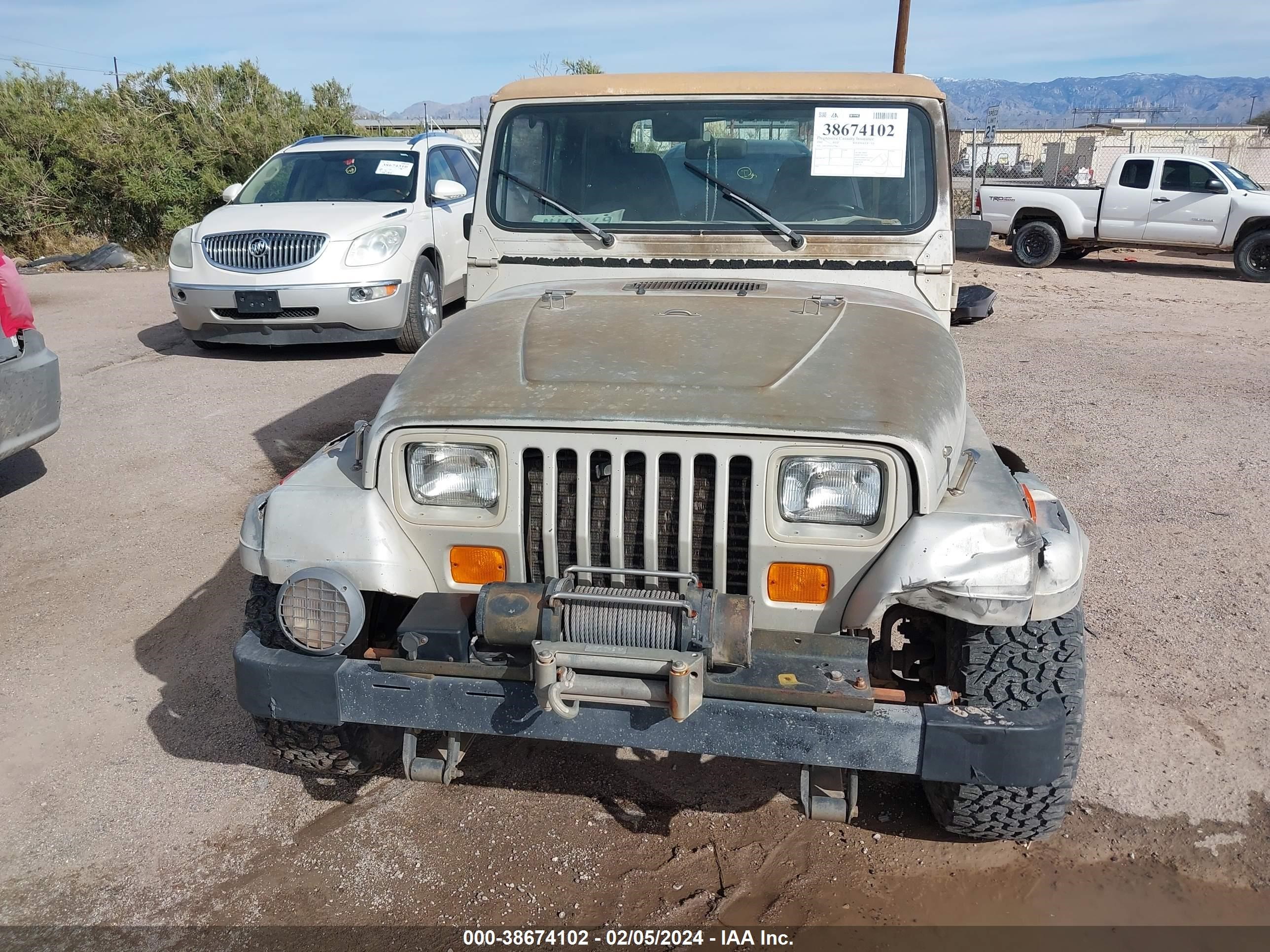 Photo 11 VIN: 2J4FY49S9NJ556571 - JEEP WRANGLER 