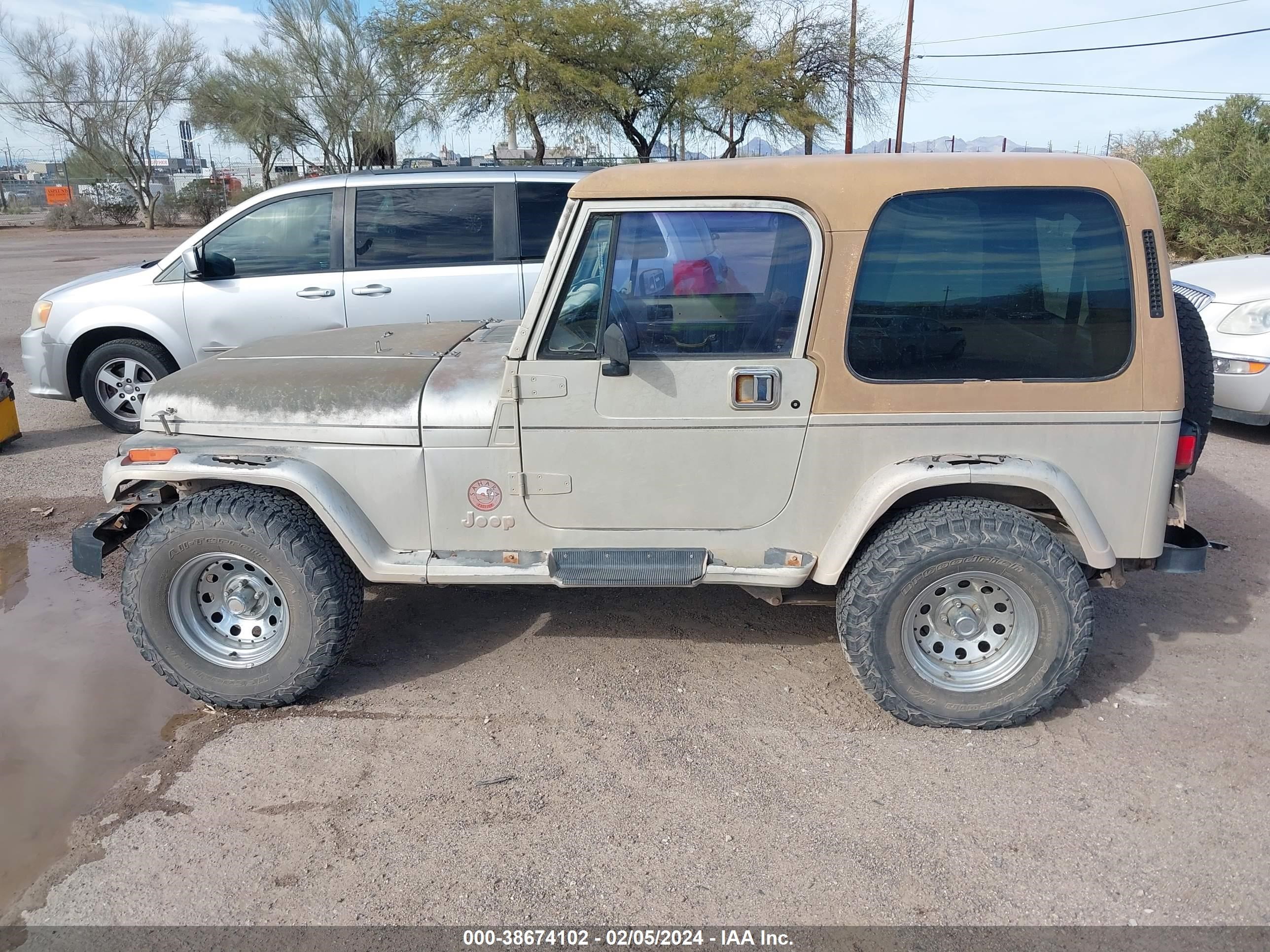 Photo 13 VIN: 2J4FY49S9NJ556571 - JEEP WRANGLER 