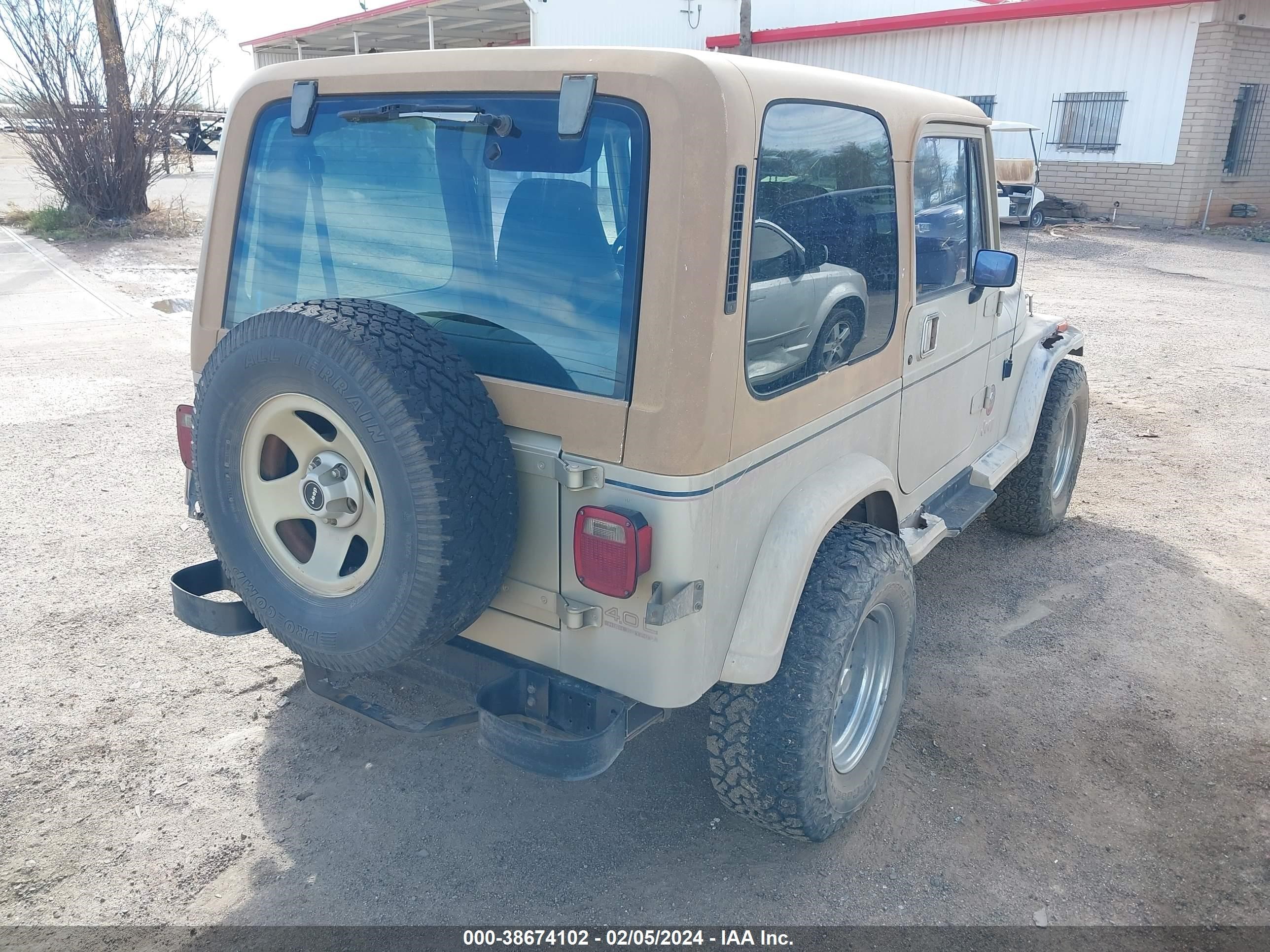 Photo 3 VIN: 2J4FY49S9NJ556571 - JEEP WRANGLER 