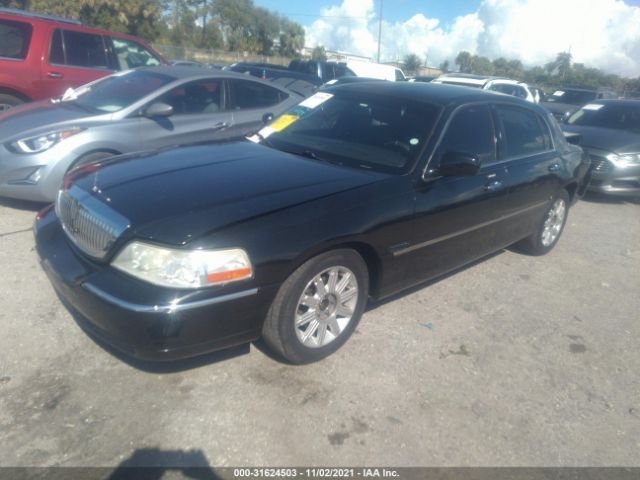 Photo 1 VIN: 2LNBL8CV8BX753359 - LINCOLN TOWN CAR 