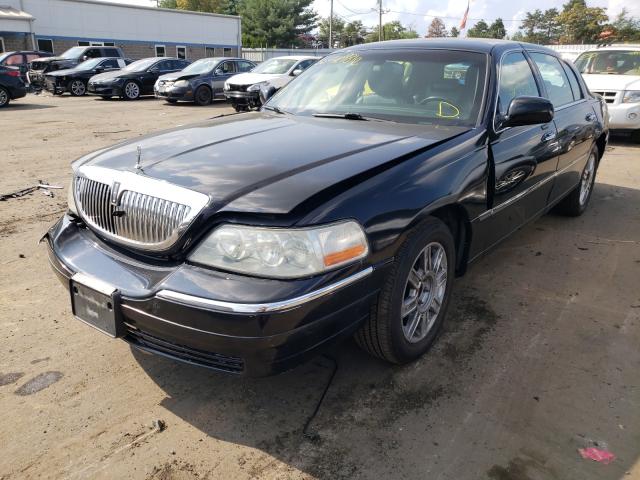 Photo 1 VIN: 2LNBL8EV4BX754554 - LINCOLN TOWN CAR E 