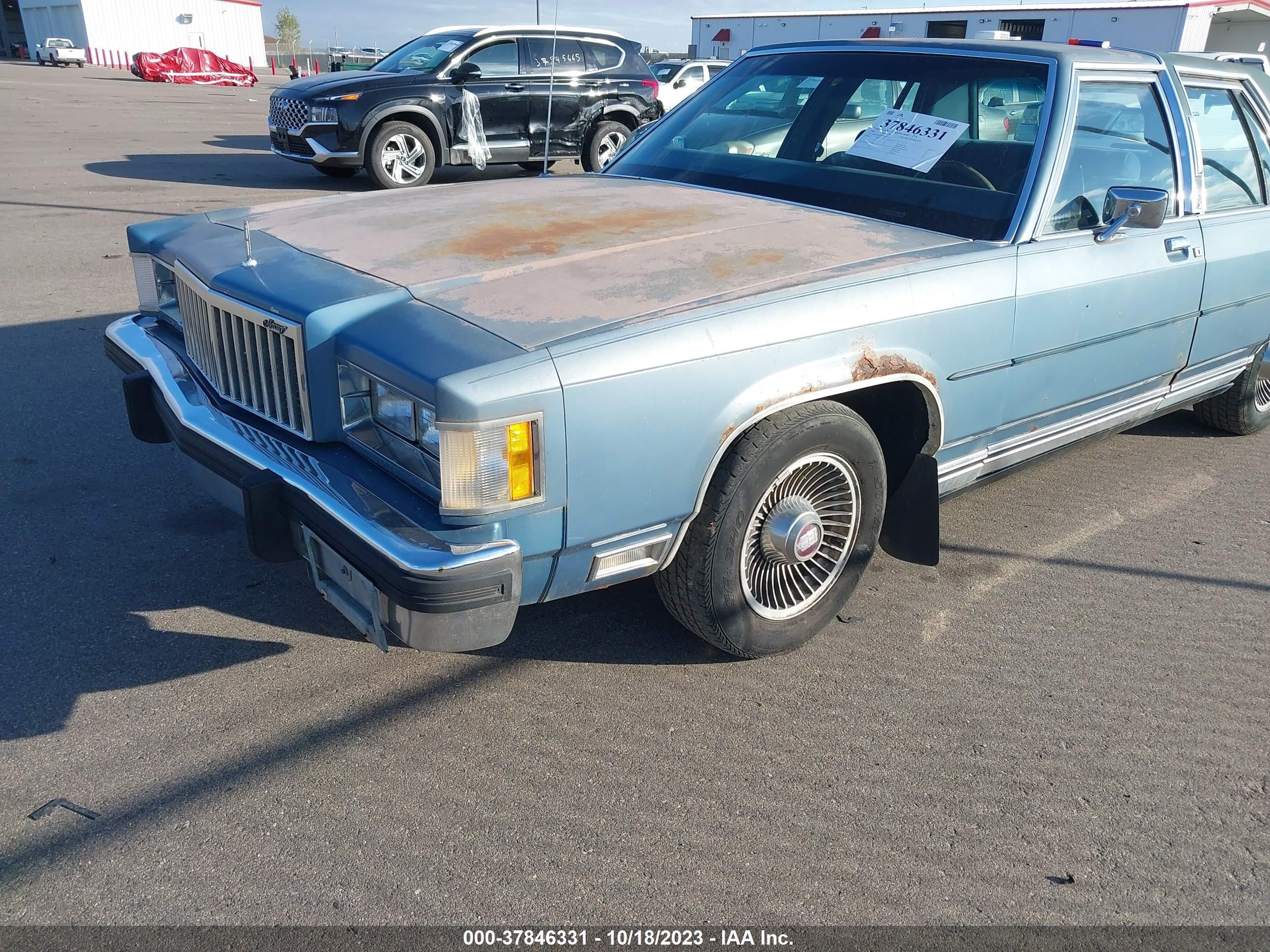 Photo 5 VIN: 2MEBP95F4GX703505 - MERCURY GRAND MARQUIS 