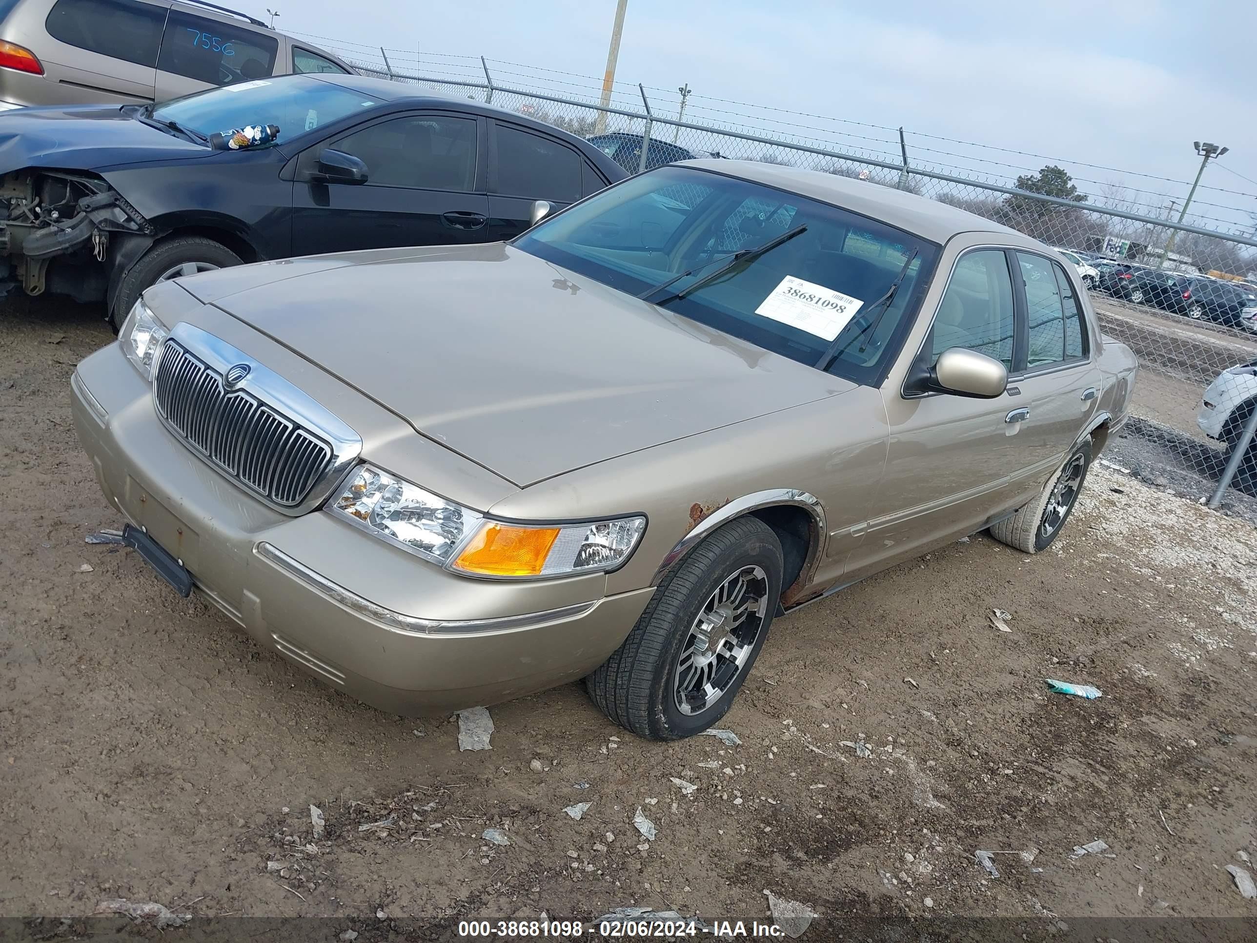 Photo 1 VIN: 2MEFM74W4XX687158 - MERCURY GRAND MARQUIS 