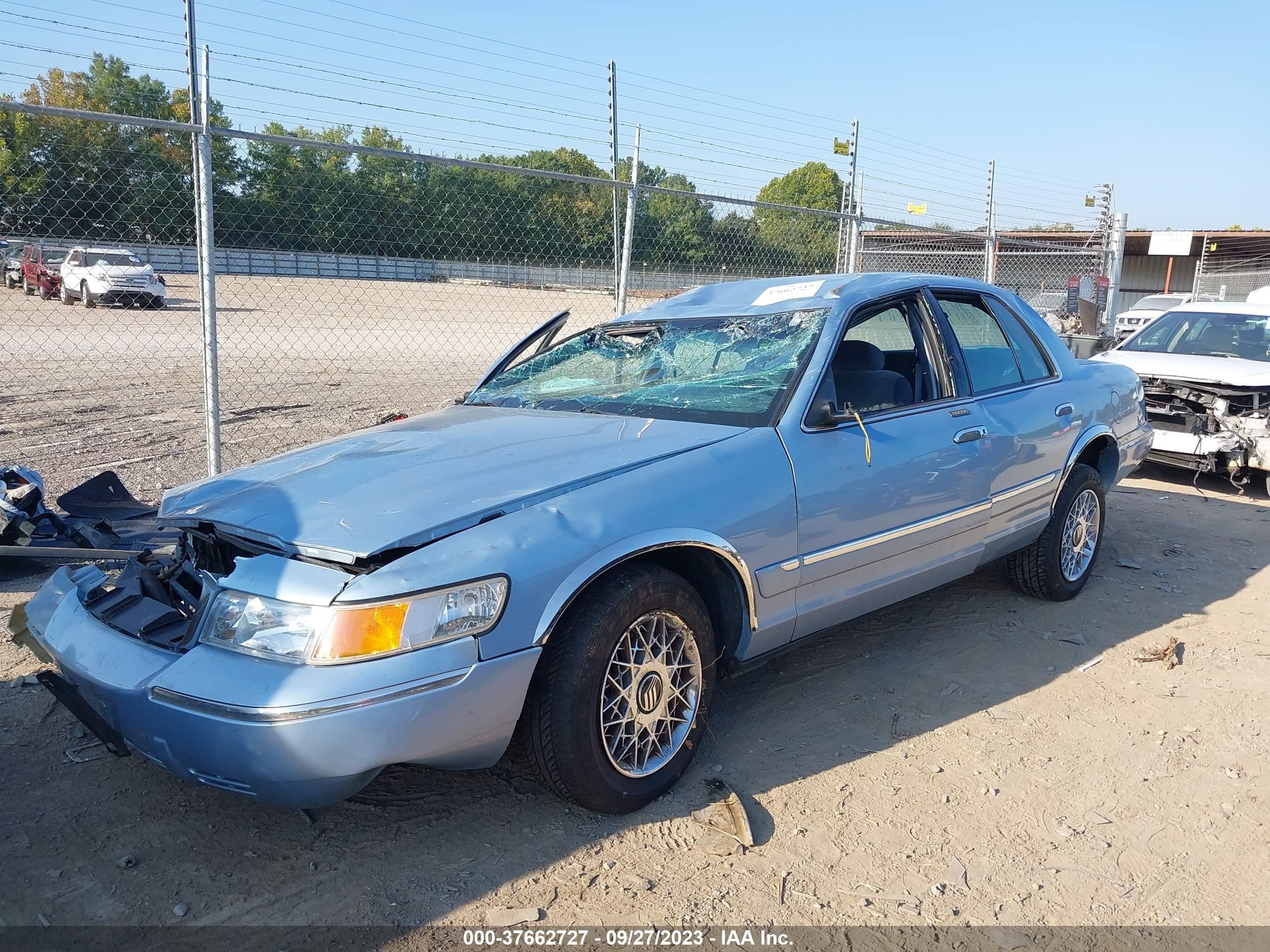 Photo 1 VIN: 2MEFM74W8XX608400 - MERCURY GRAND MARQUIS 